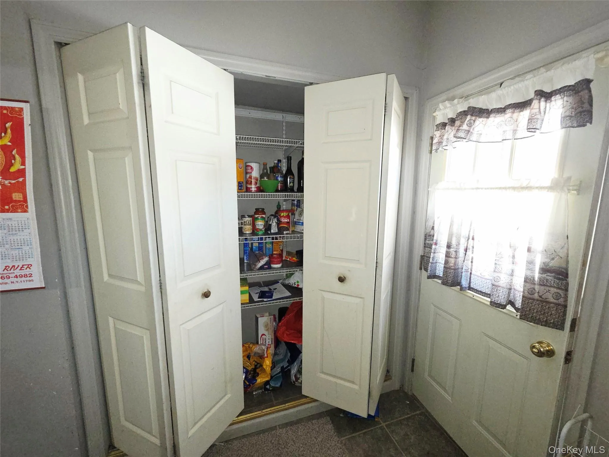 Food pantry by back door & another pantry by front door Food pantry by back door & another pantry by front door