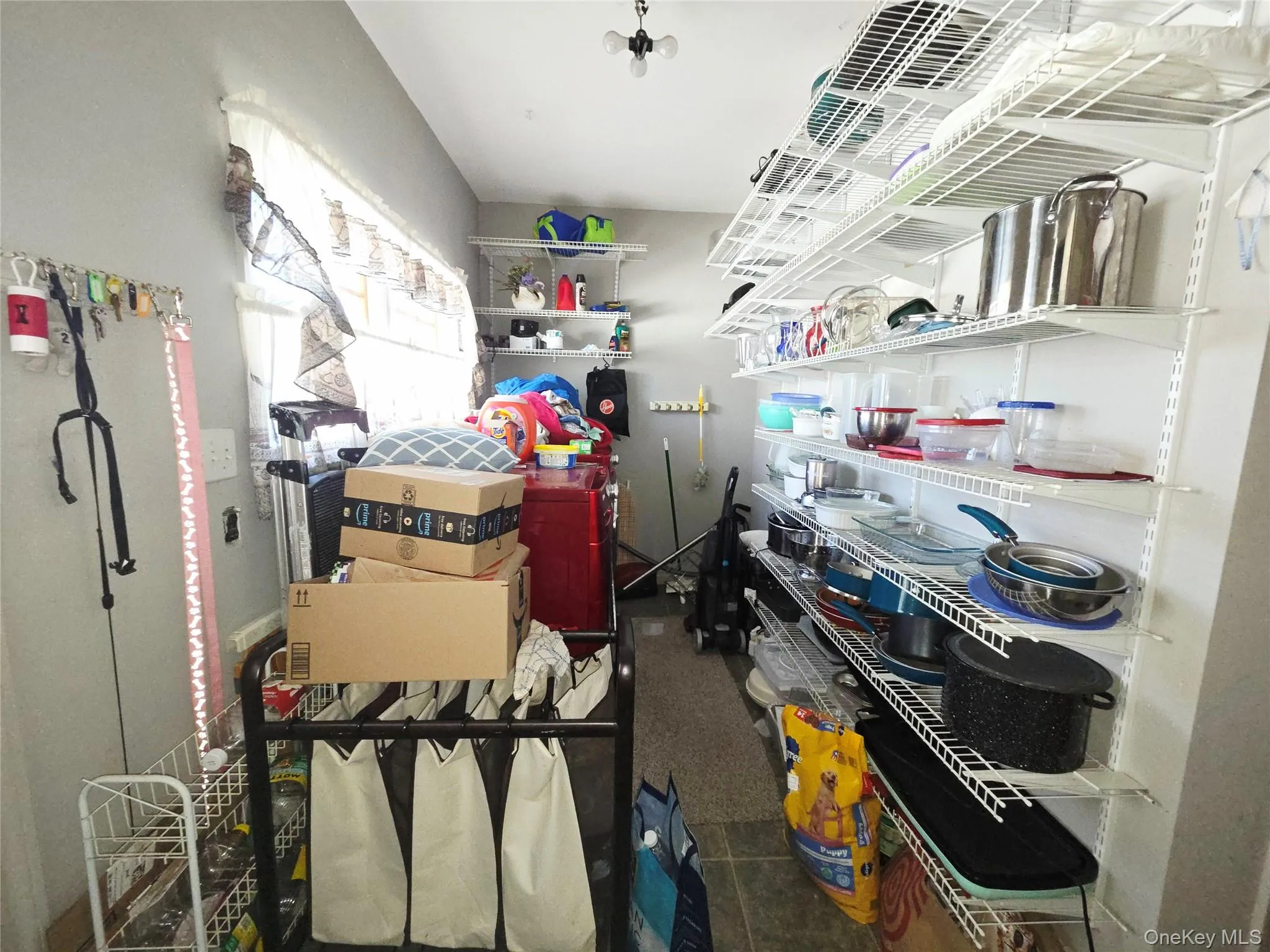 Laundry and storage behind the kitchen Laundry and storage behind the kitchen