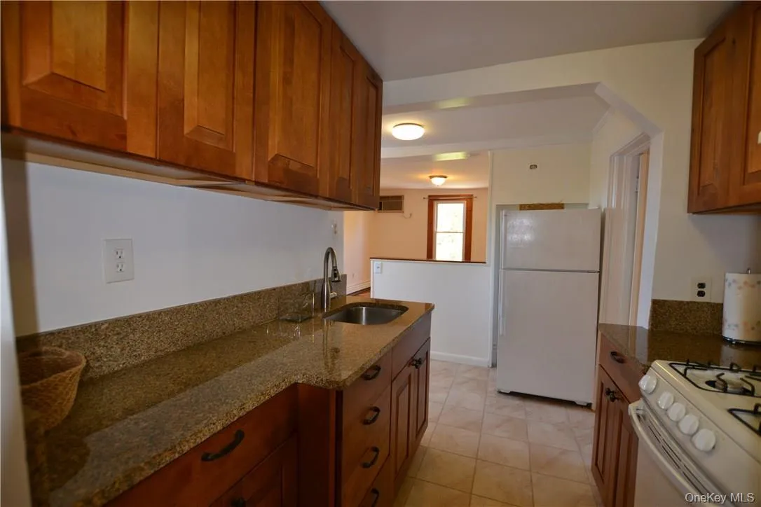 Kitchen has granite counters Kitchen has granite counters