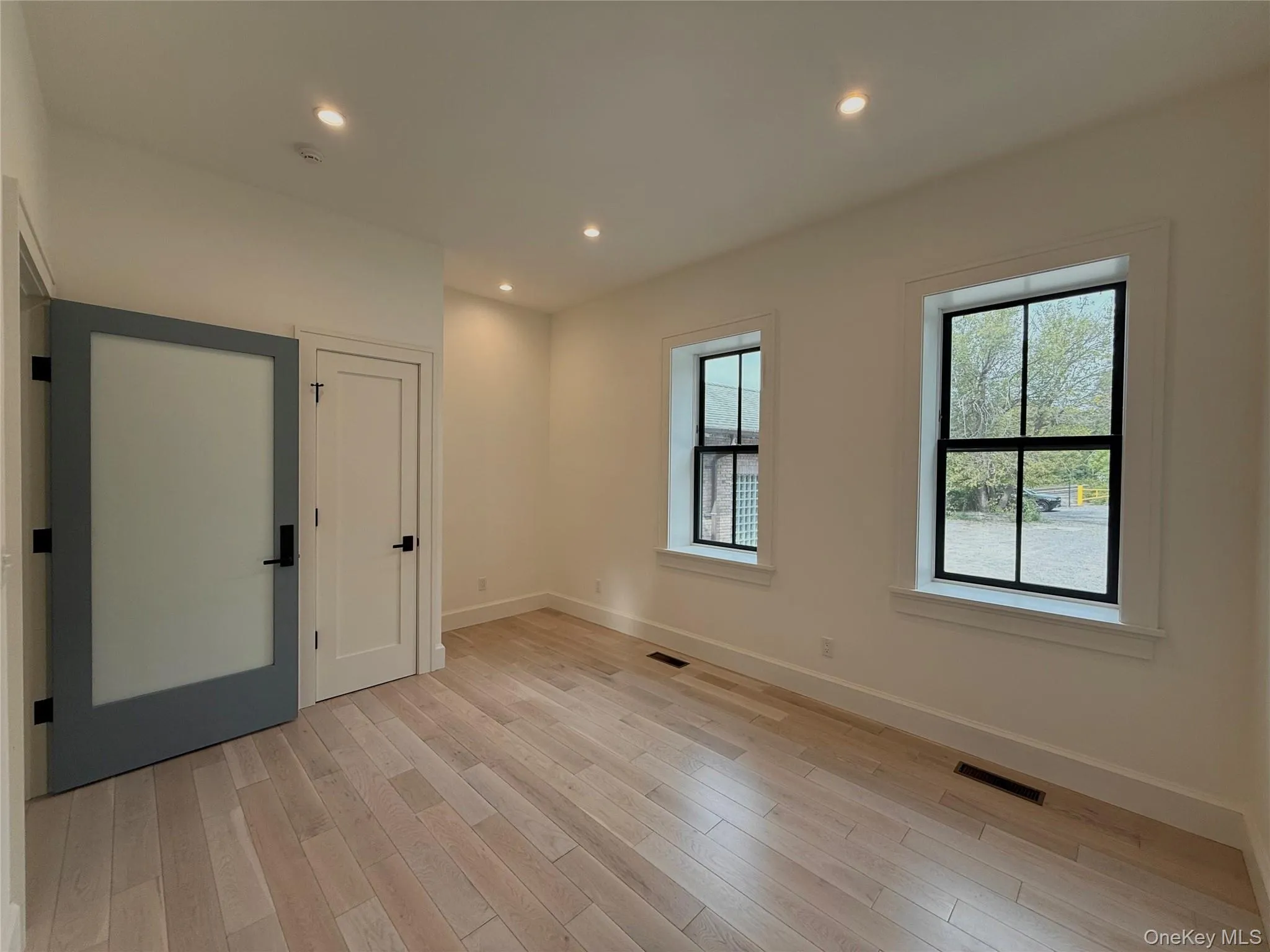 Bright and airy office space with high ceilings, closet storage and hardwood floors Bright and airy office space with high ceilings, closet storage and hardwood floors