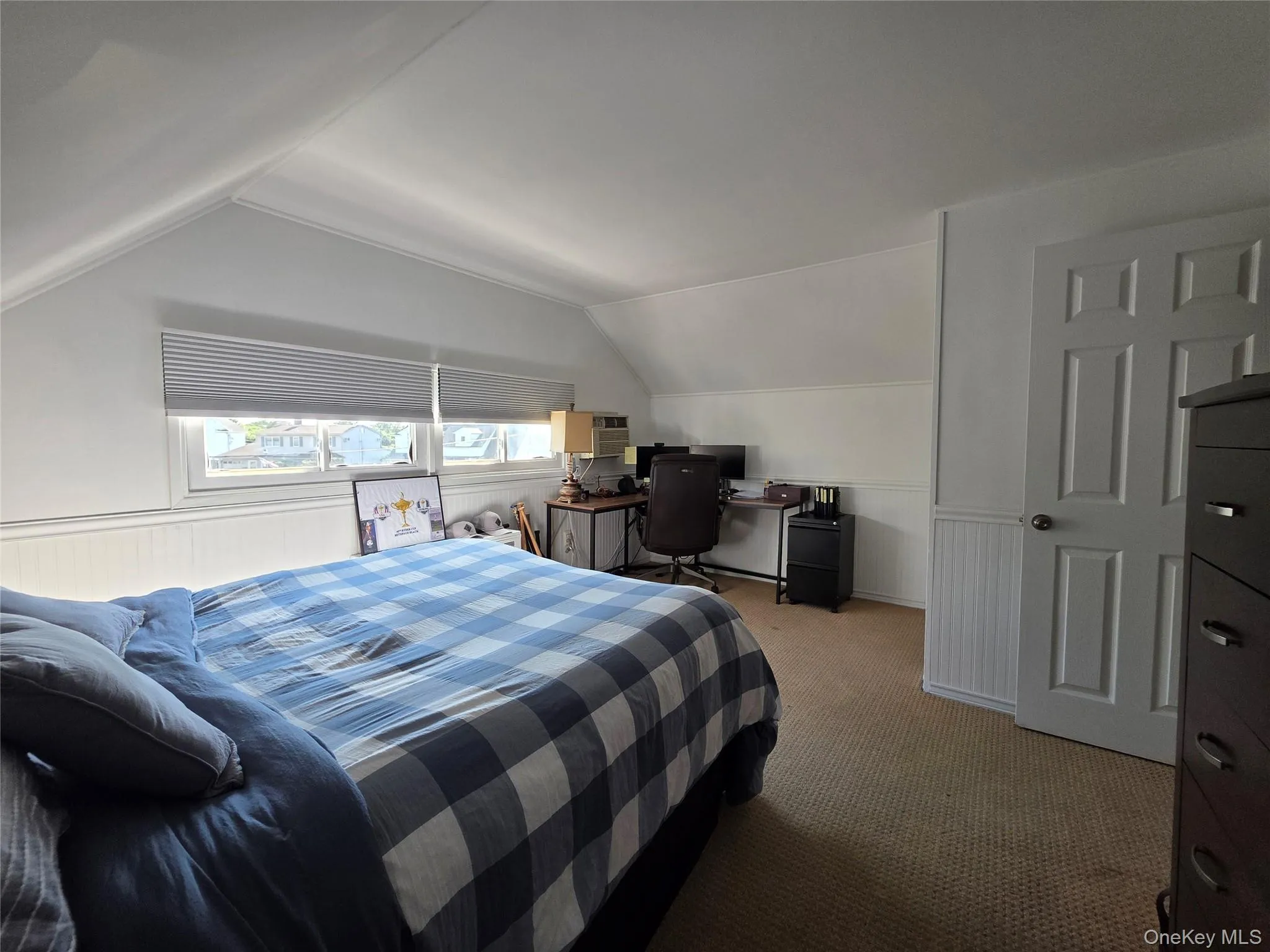 Bedroom 4 - Freshly painted in 2026 - 1 A/C wall unit - newly designed closet with access to crawl space for extra storage - new blinds - carpet Bedroom 4 - Freshly painted in 2026 - 1 A/C wall unit - newly designed closet with access to crawl space for extra storage - new blinds - carpet