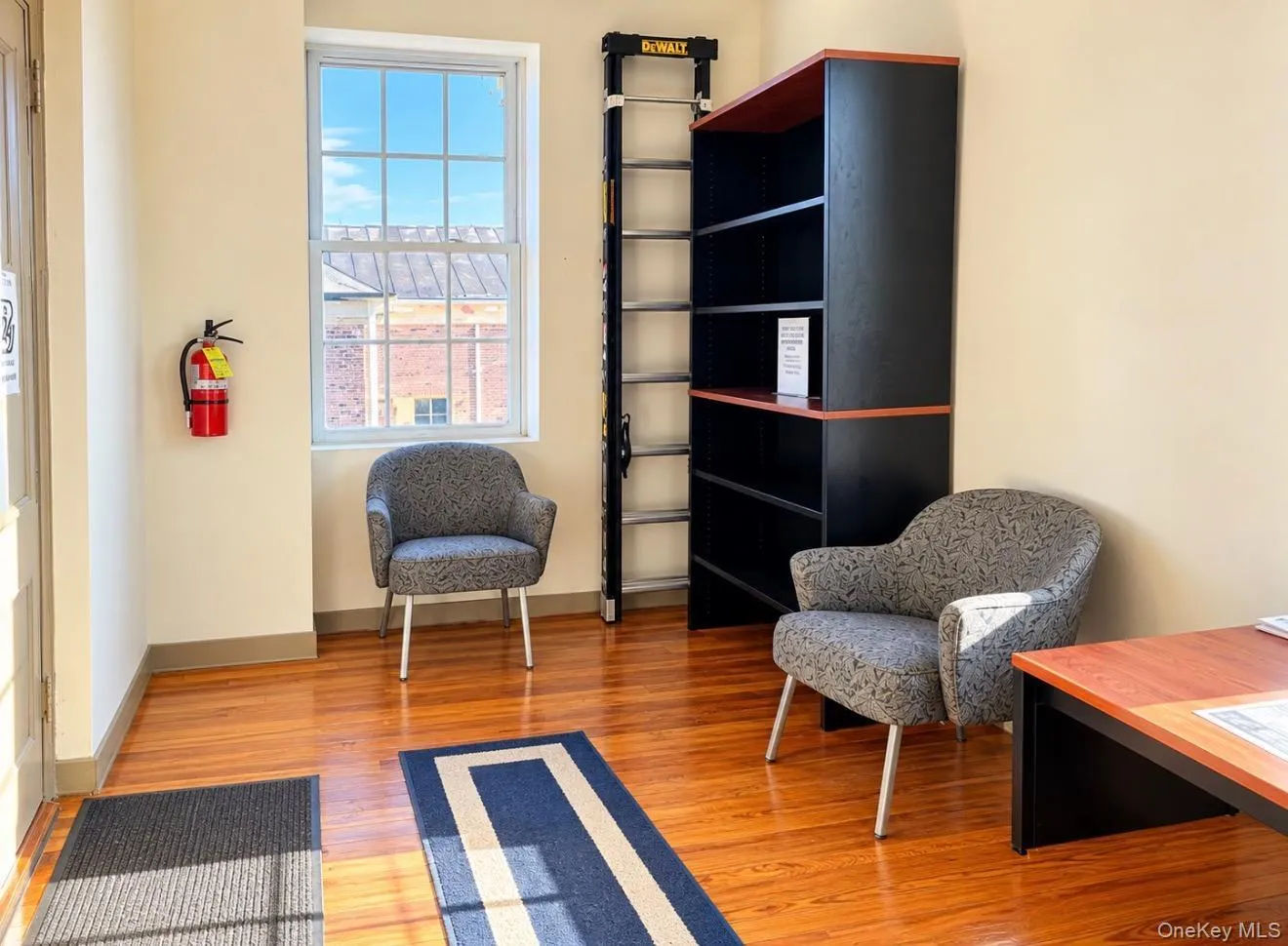 Wood-finish flooring with a neutral wall color, providing a versatile backdrop Wood-finish flooring with a neutral wall color, providing a versatile backdrop