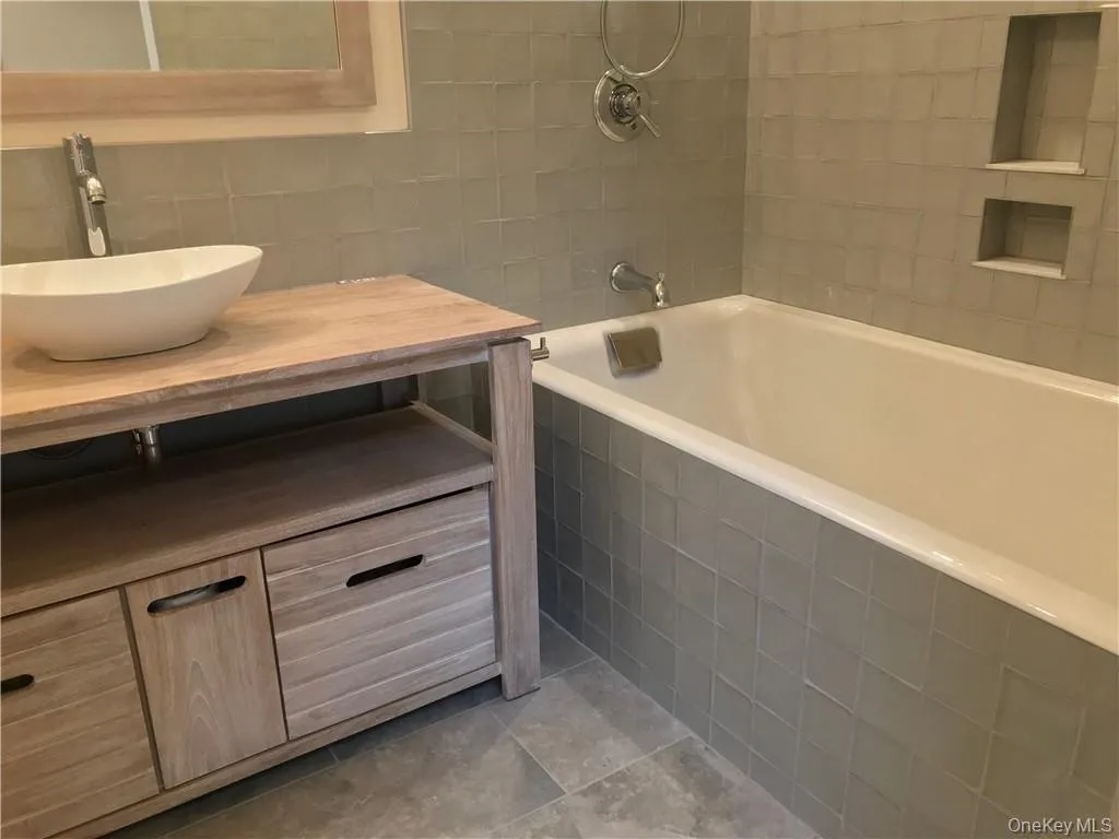 Radiant heated floor. Contemporary cabinetry with storage Radiant heated floor. Contemporary cabinetry with storage