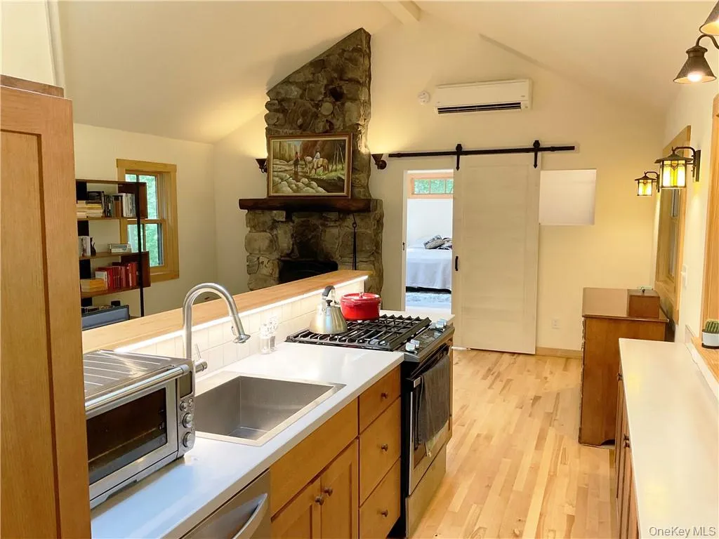 Galley style kitchen opens to the great room Galley style kitchen opens to the great room