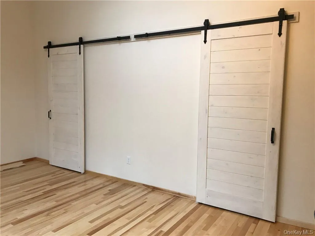 The use of barn doors to maximize space The use of barn doors to maximize space