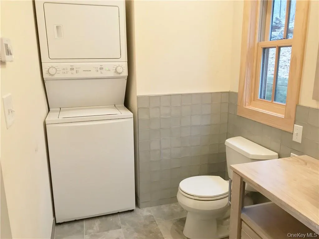A built in water/dryer completes the bath room A built in water/dryer completes the bath room