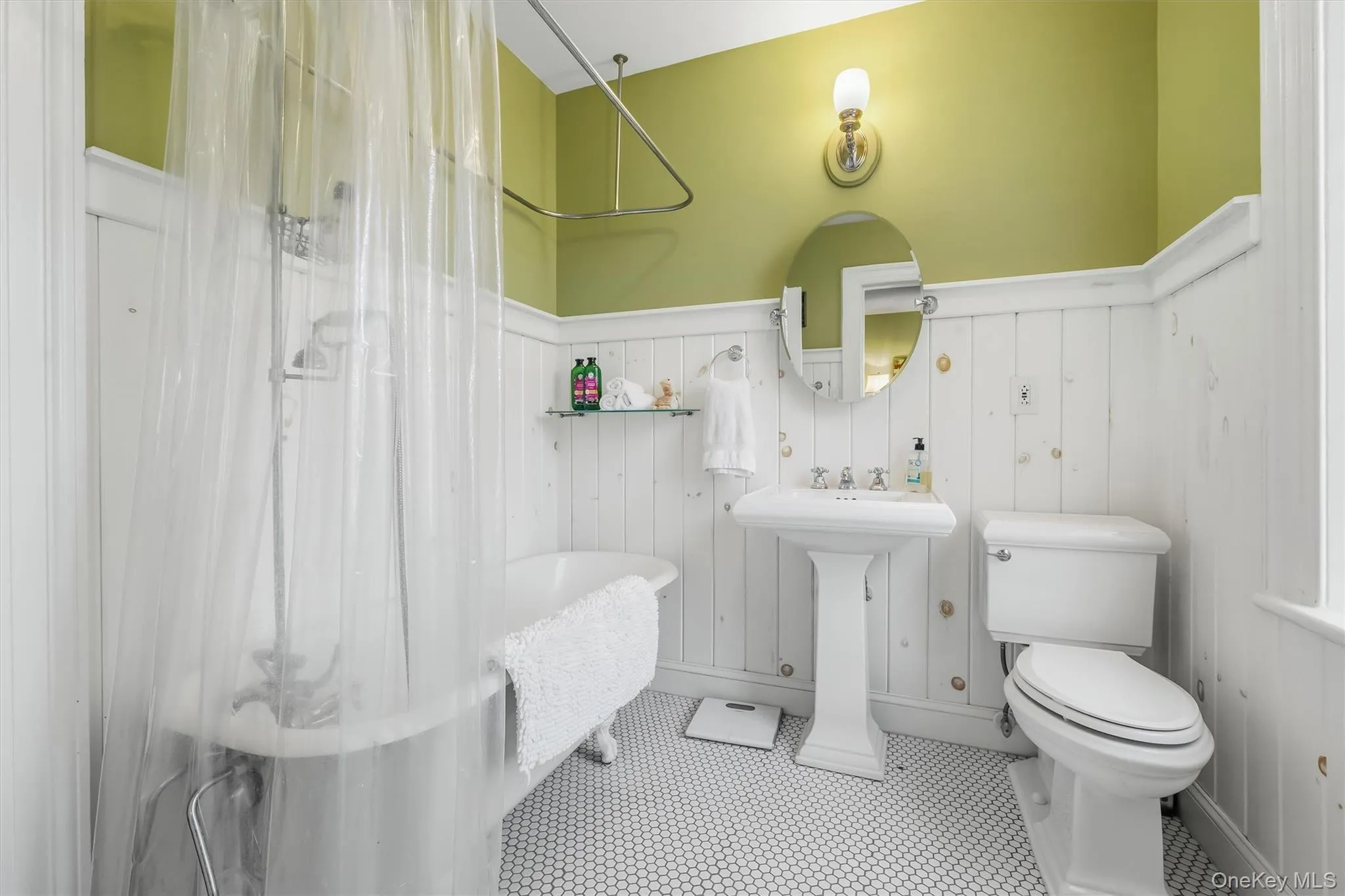 Hall bathroom with access from second bedroom Hall bathroom with access from second bedroom