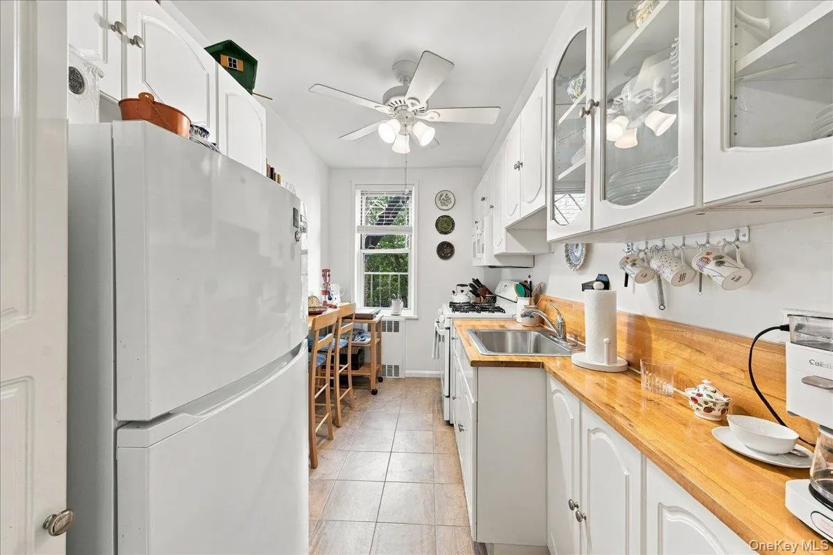 Updated kitchen with window and counter seating Updated kitchen with window and counter seating