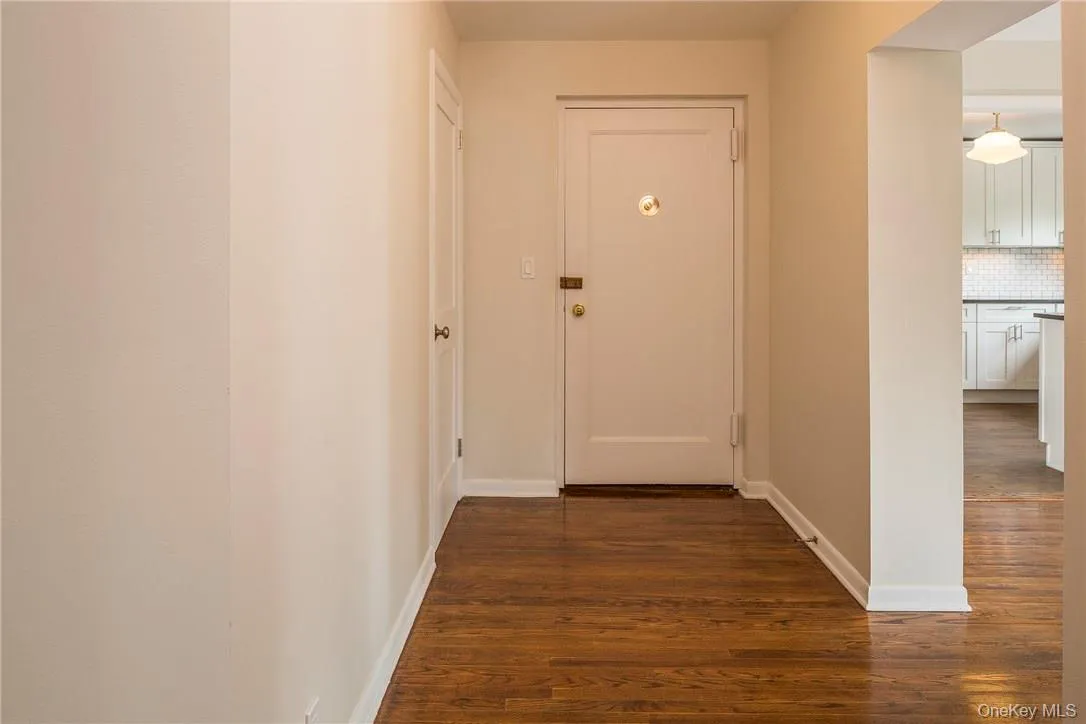 Apartment entry with separate coat closet Apartment entry with separate coat closet