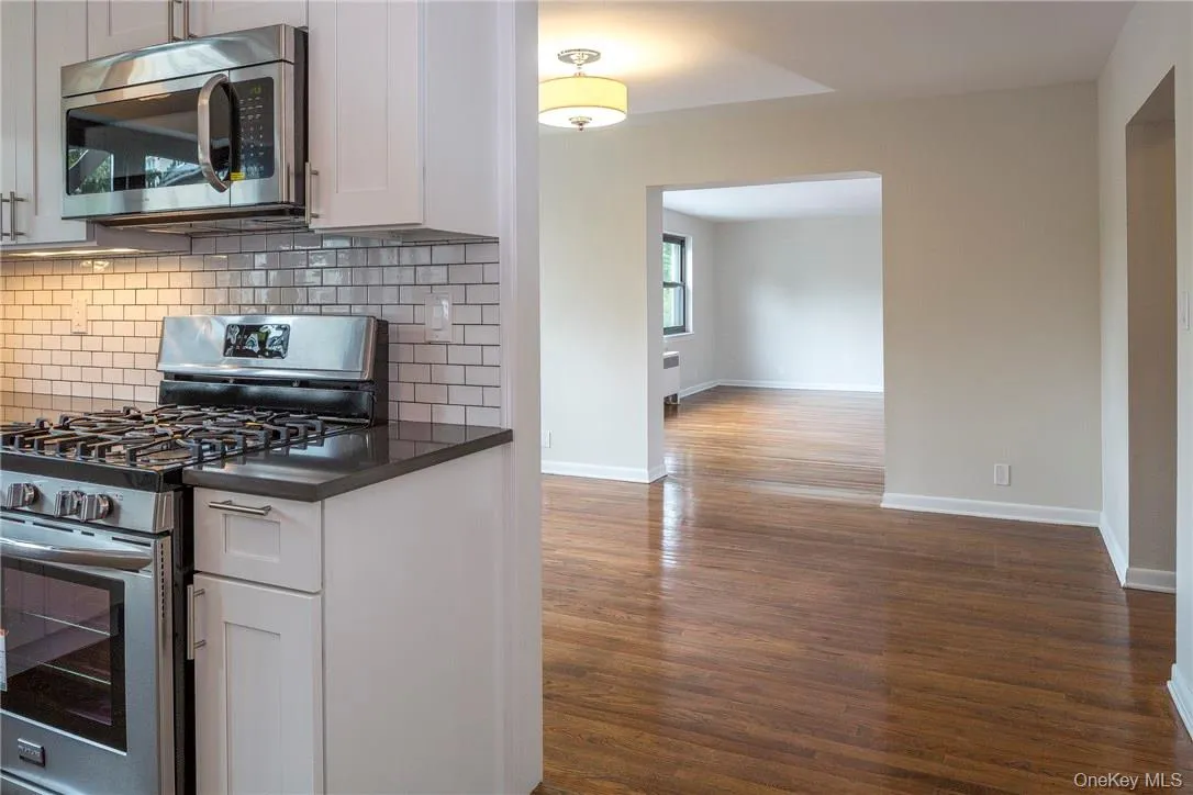 Kitchen adjoins separate dining room and huge living room. Kitchen adjoins separate dining room and huge living room.