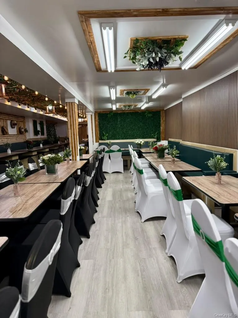 Recessed ceiling lighting, wood-finish flooring, wood paneling Recessed ceiling lighting, wood-finish flooring, wood paneling
