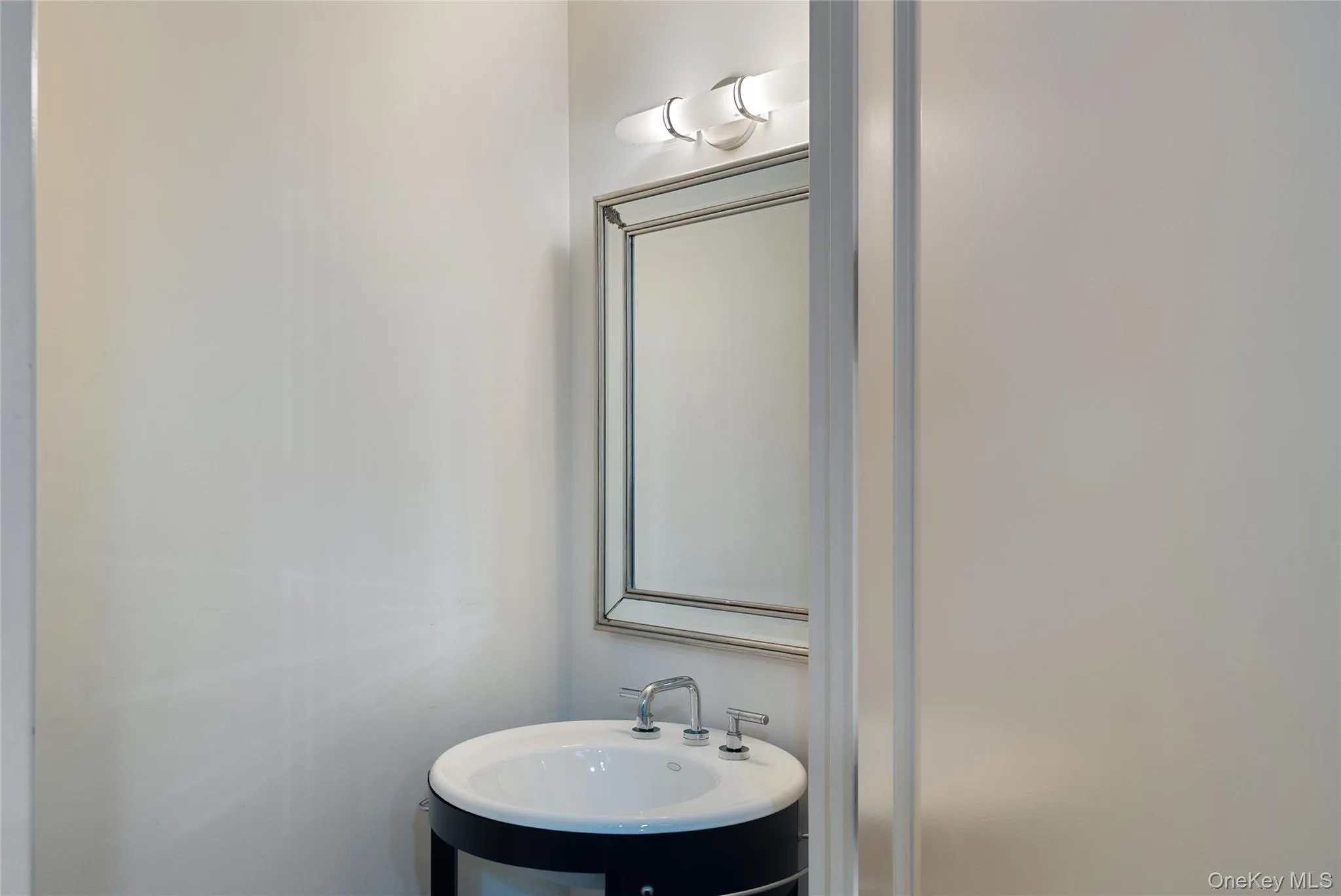Powder Room at front of unit Powder Room at front of unit