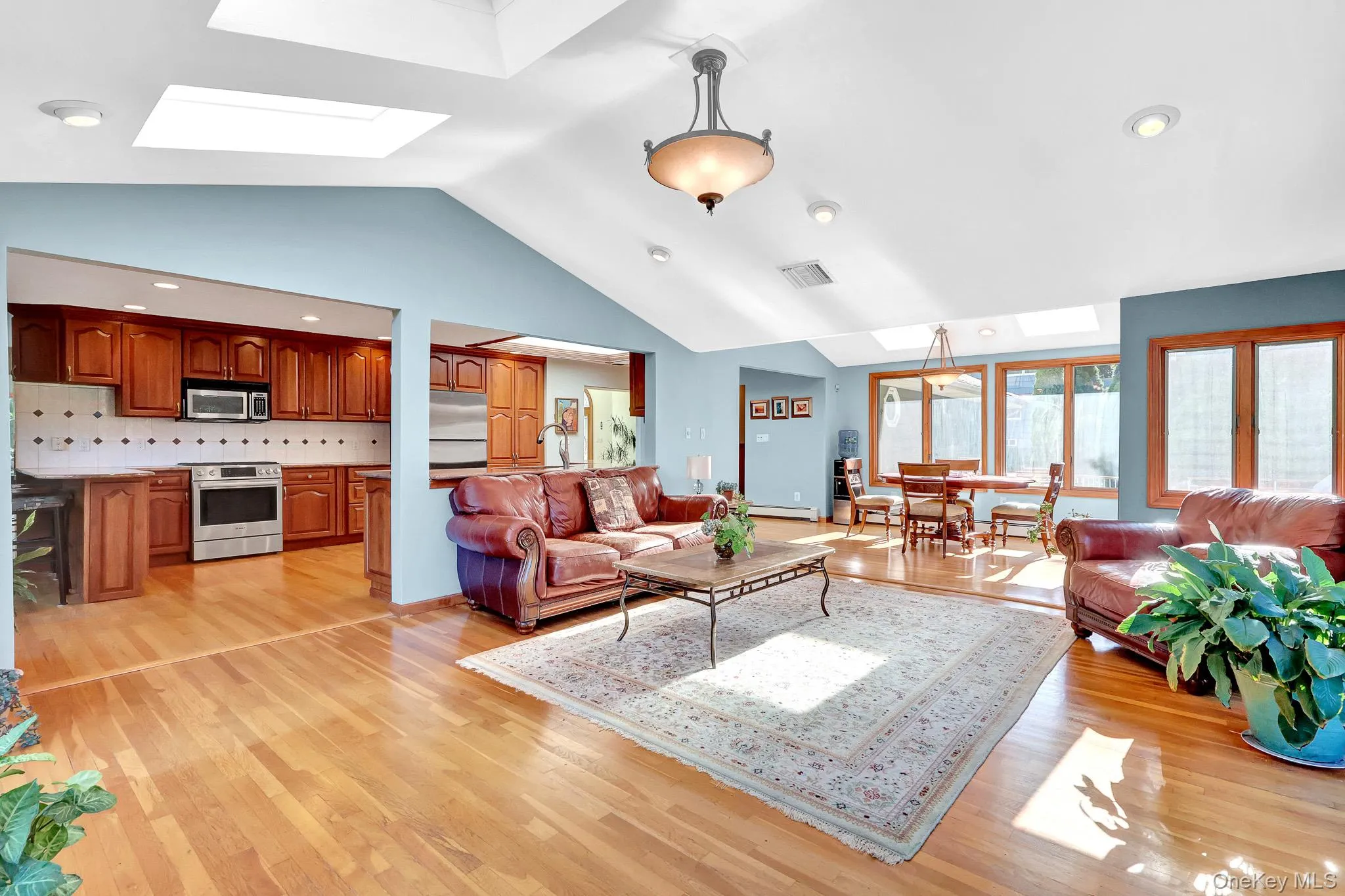 den with aliding doors onto patio & SKYLIGHTS den with aliding doors onto patio & SKYLIGHTS