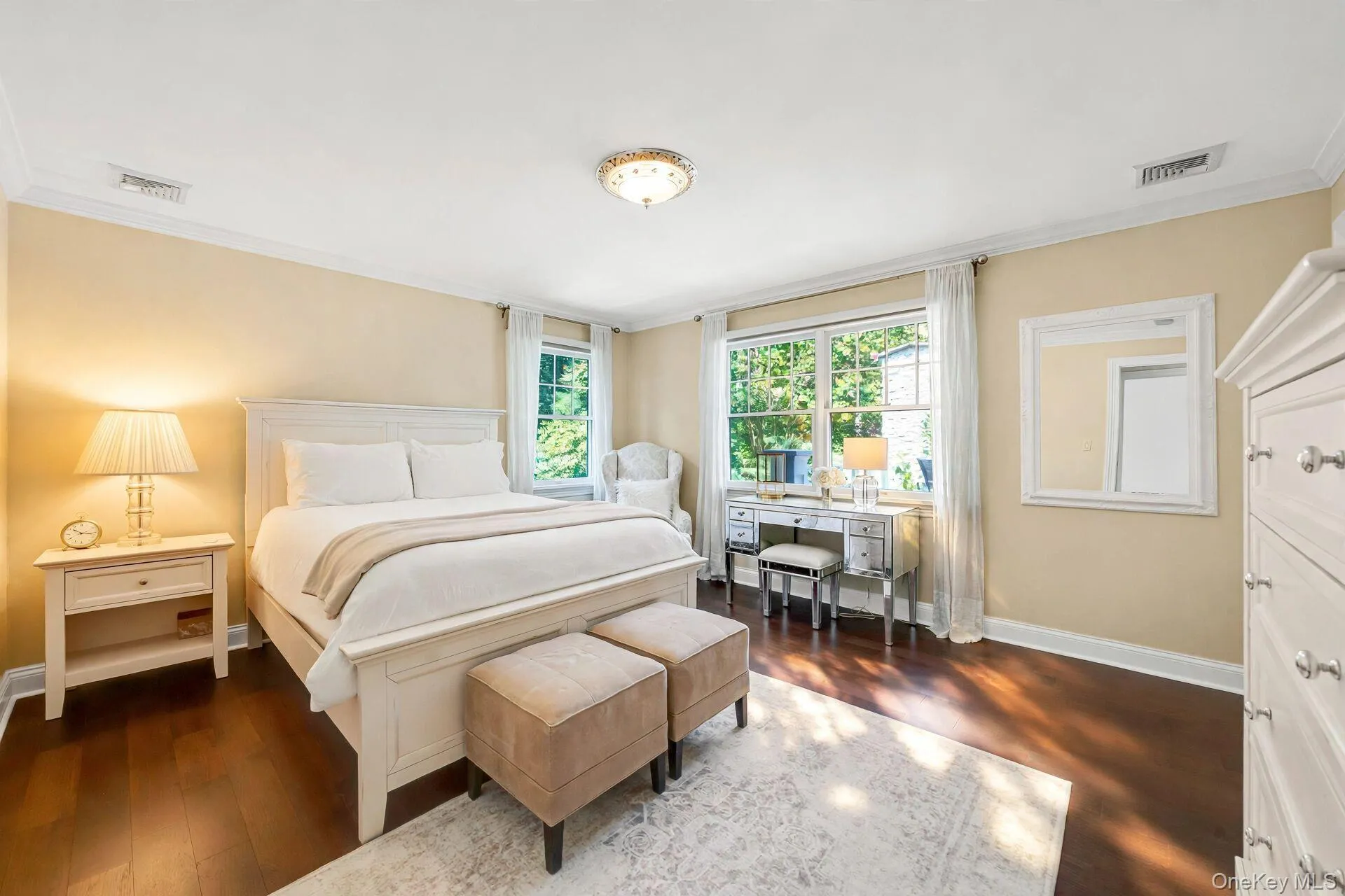 Wood-finish flooring, crown molding, and recessed lighting Wood-finish flooring, crown molding, and recessed lighting