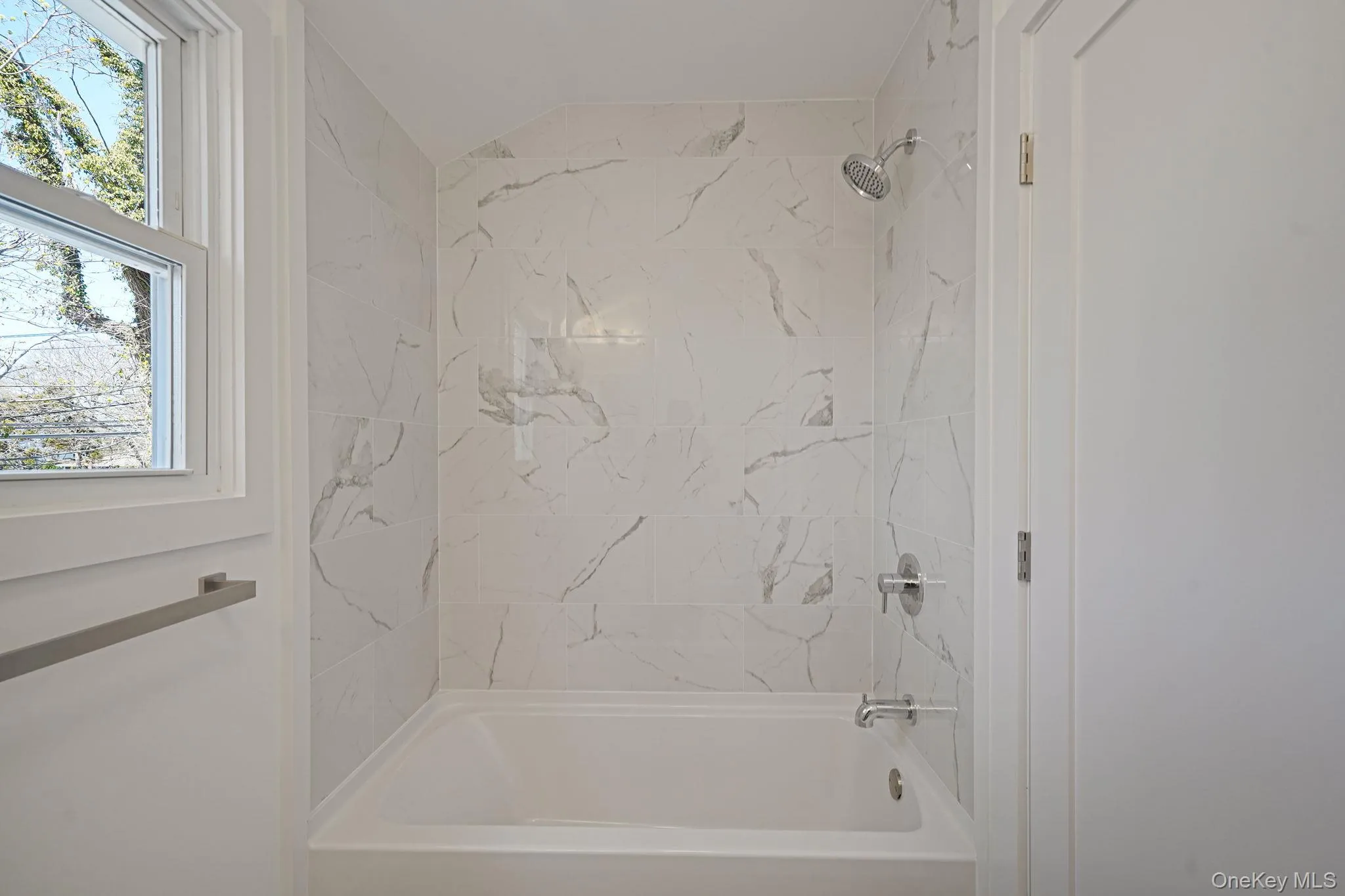 Full bath featuring tub / shower combination Full bath featuring tub / shower combination
