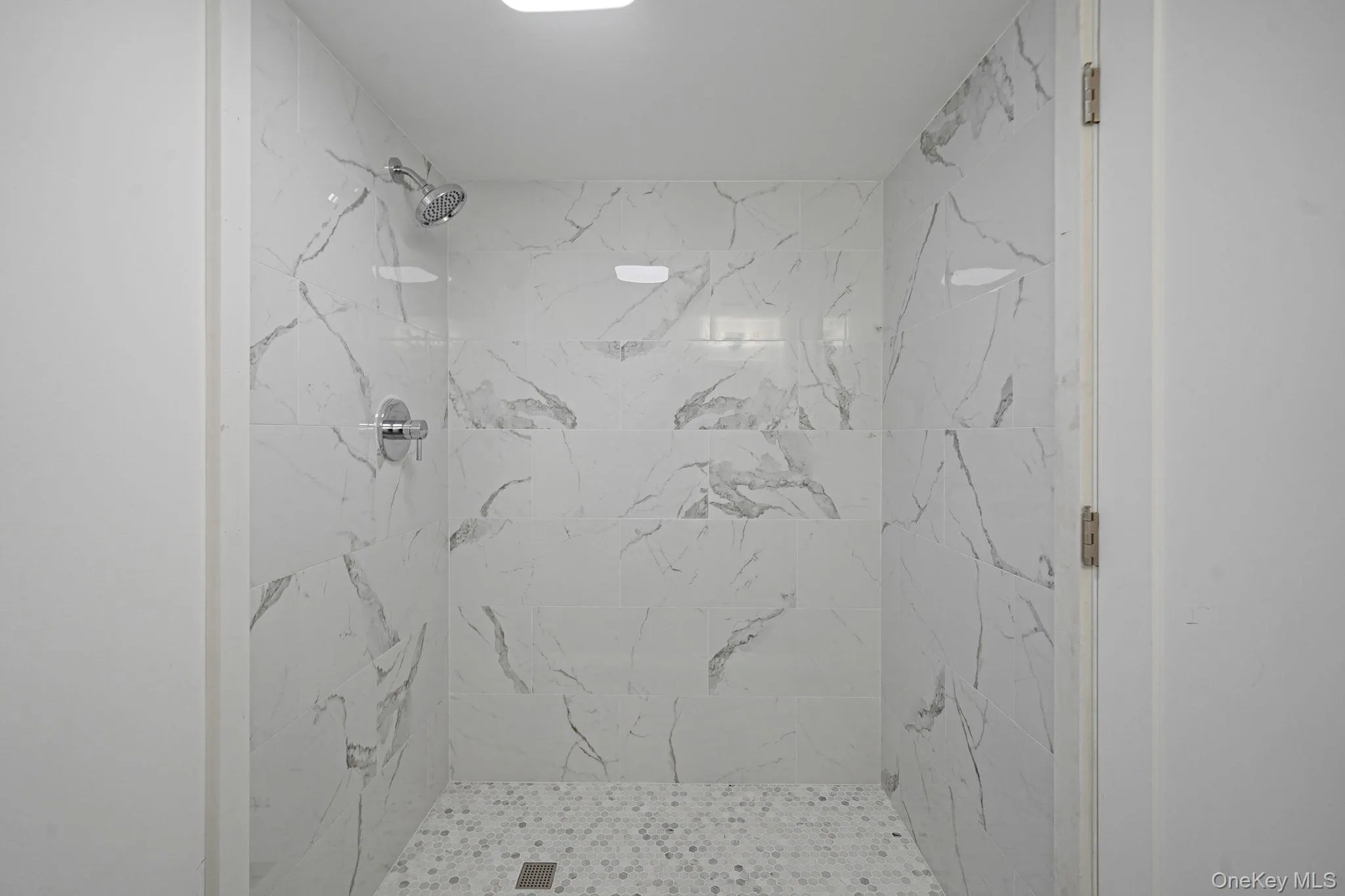 Bathroom with tiled shower Bathroom with tiled shower
