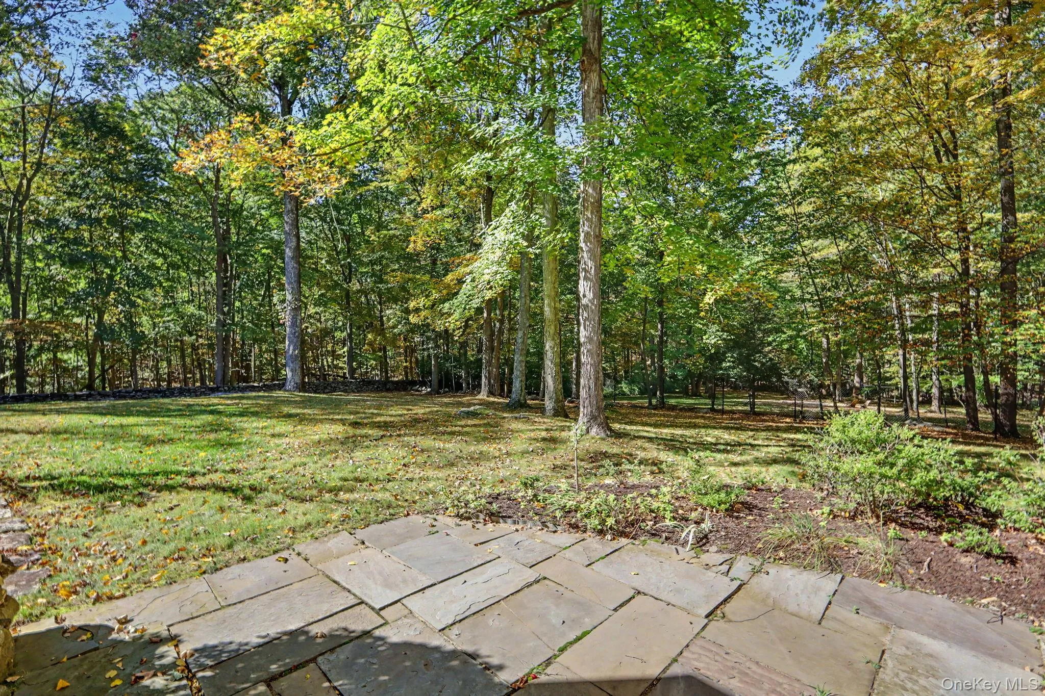 Patio overlooking private grounds. Patio overlooking private grounds.