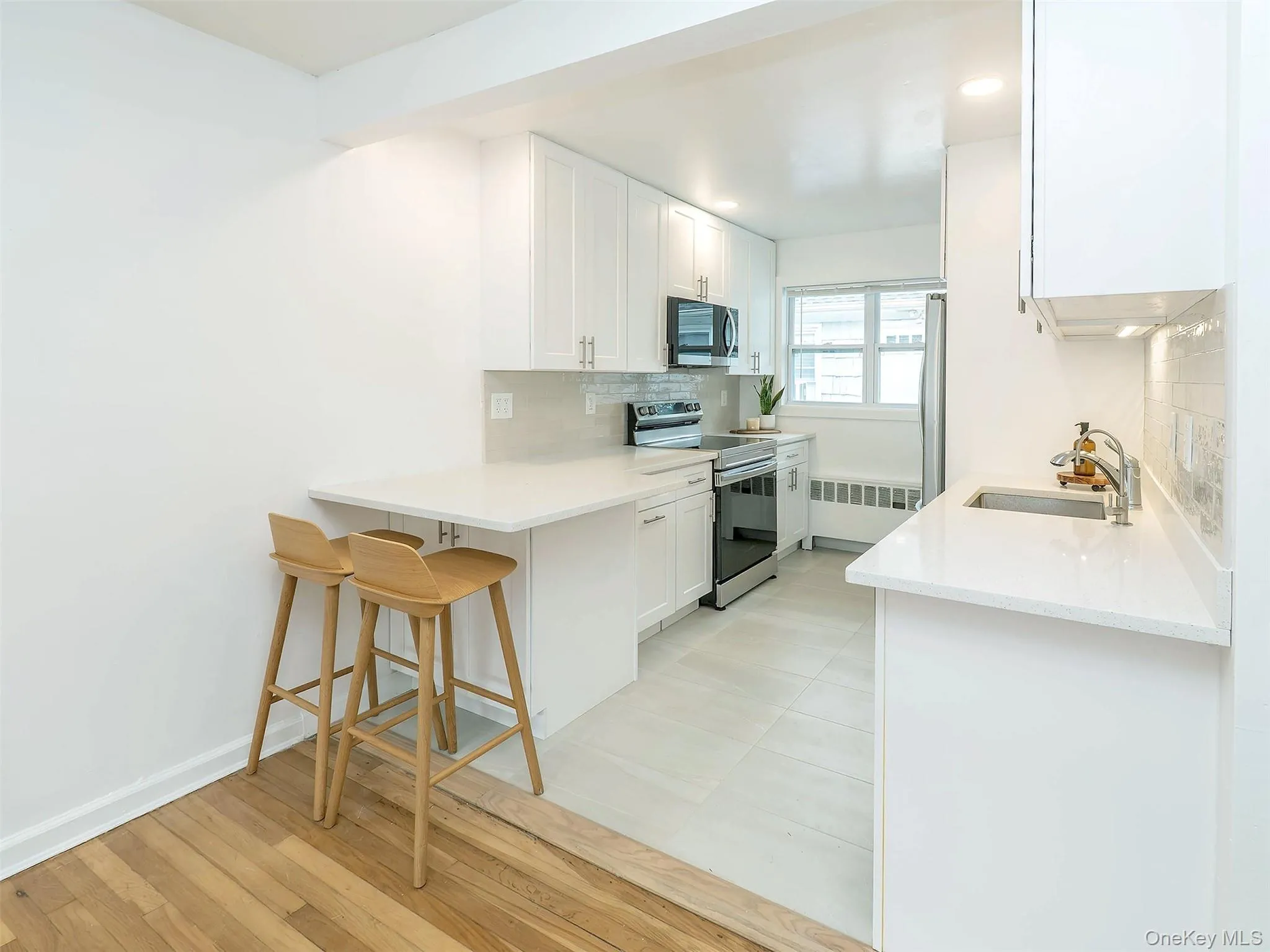 Thoughtfully design ALL BRAND NEW. Counter seating. Quartz counter tops and Shaker cabinets Thoughtfully design ALL BRAND NEW. Counter seating. Quartz counter tops and Shaker cabinets