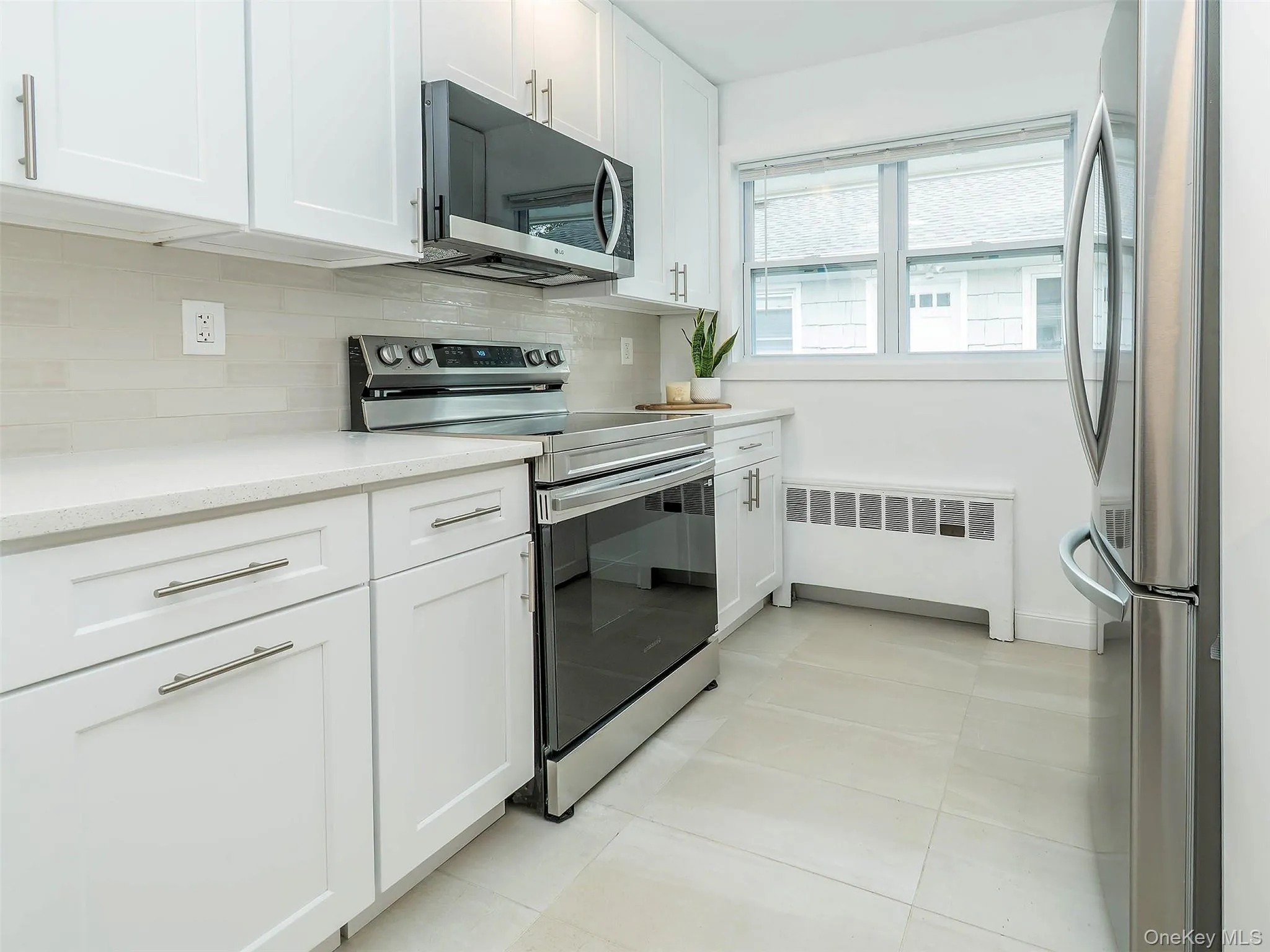 ALL NEW appliances. Induction stove, microwave, stainless steel fridge. ALL NEW appliances. Induction stove, microwave, stainless steel fridge.