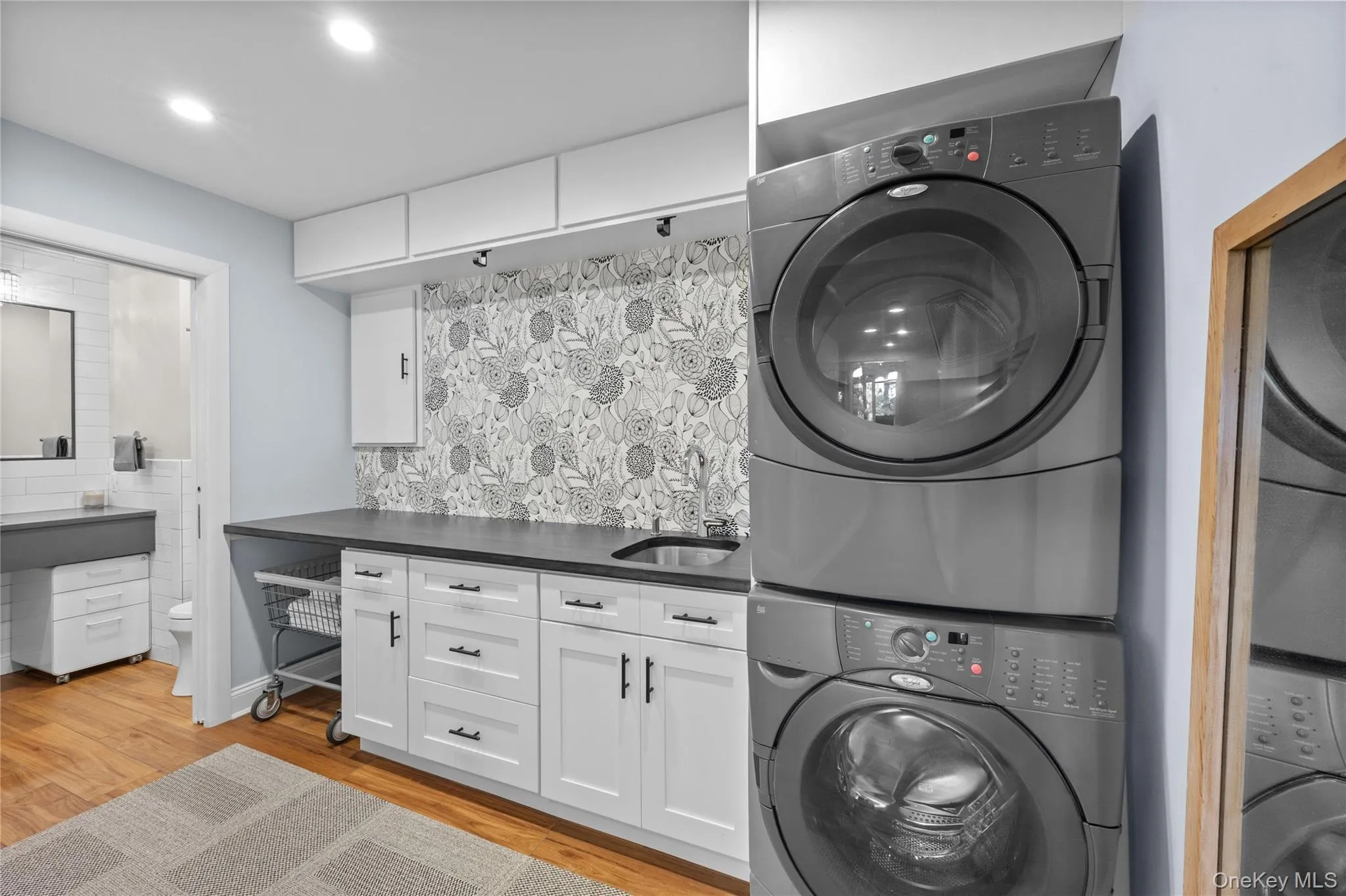 Laundry area with built in counters and shelving Laundry area with built in counters and shelving