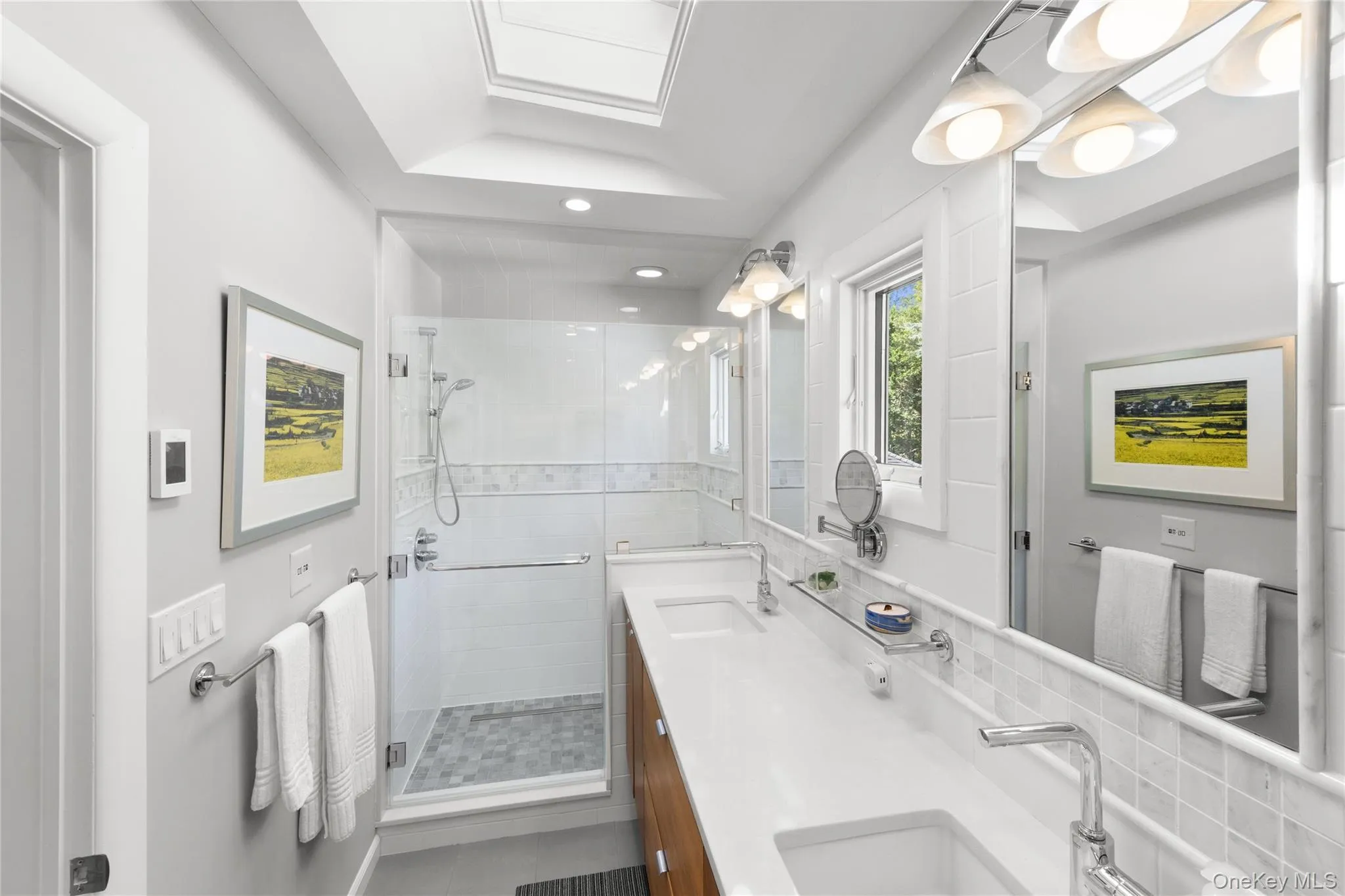 Sun filled renovated primary bathroom with beautiful finishes and many special features Sun filled renovated primary bathroom with beautiful finishes and many special features