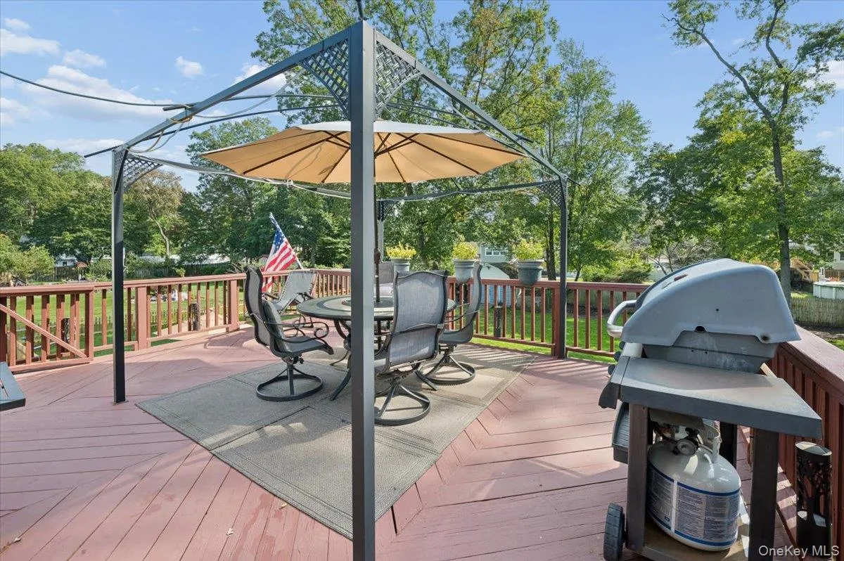 Huge deck overlooking your stunning backyard. Huge deck overlooking your stunning backyard.