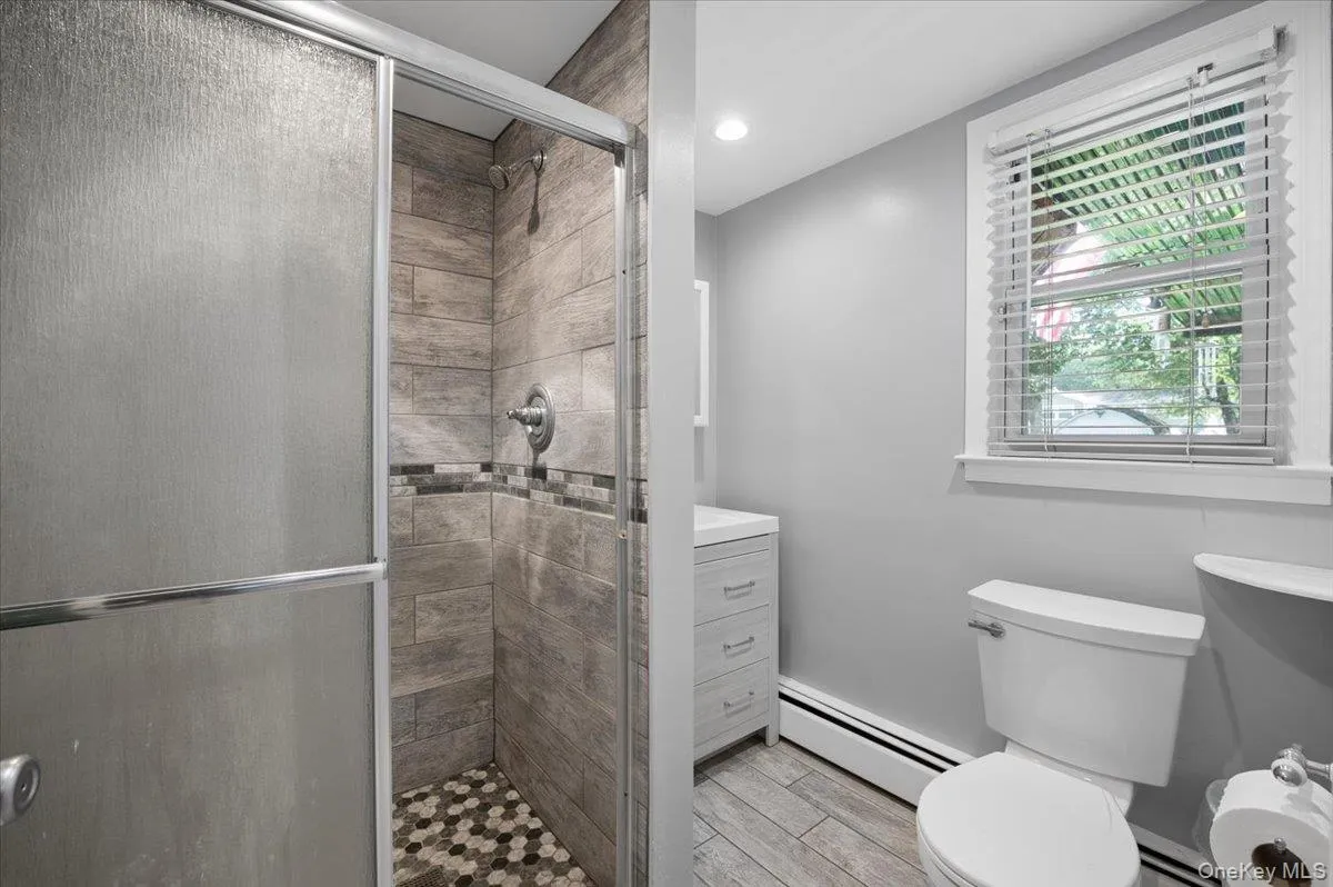 Updated lower level bathroom. Updated lower level bathroom.