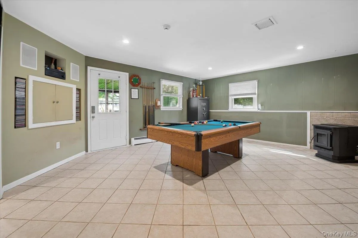 Large family room with access to your outside deck and fabulous backyard. Large family room with access to your outside deck and fabulous backyard.