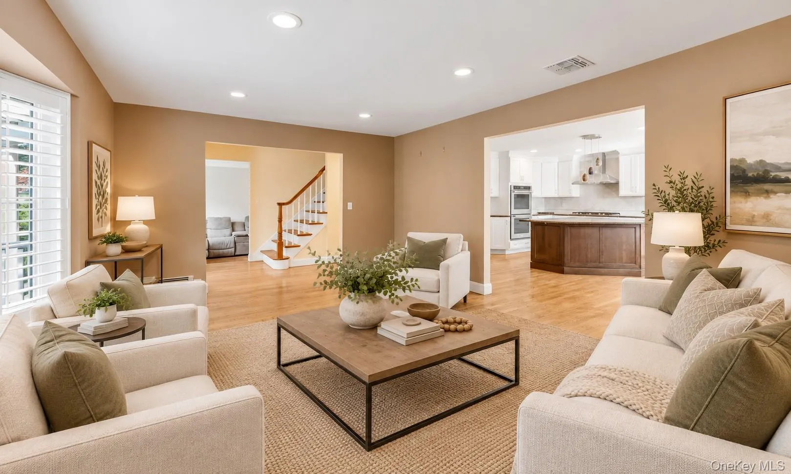 Entry to Upstairs and Living Room to Kitchen virtually staged Entry to Upstairs and Living Room to Kitchen virtually staged