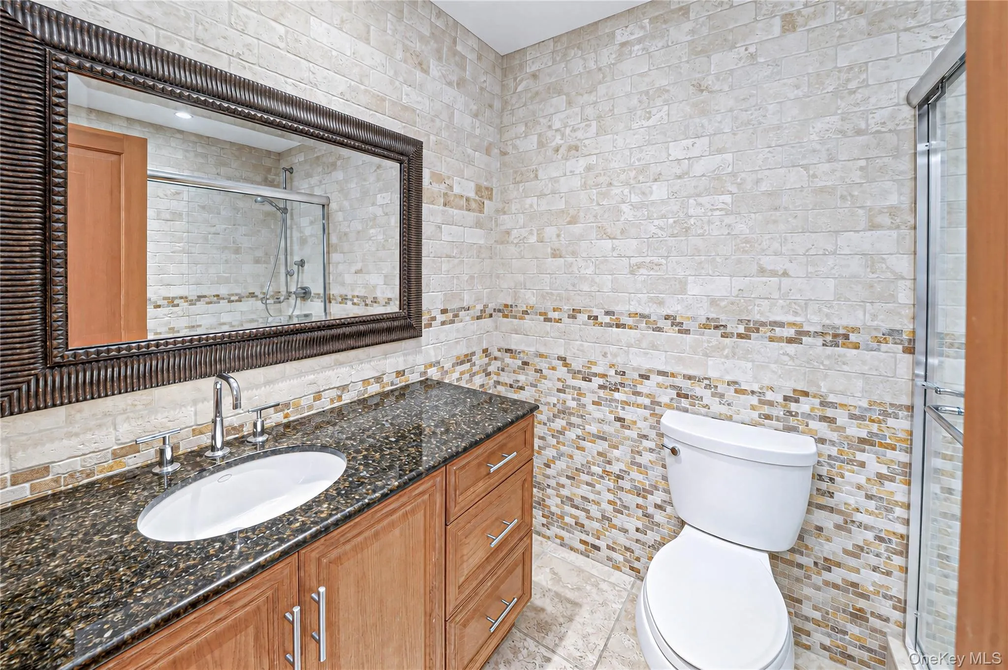 Full bath with stall shower - first floor, family room location Full bath with stall shower - first floor, family room location