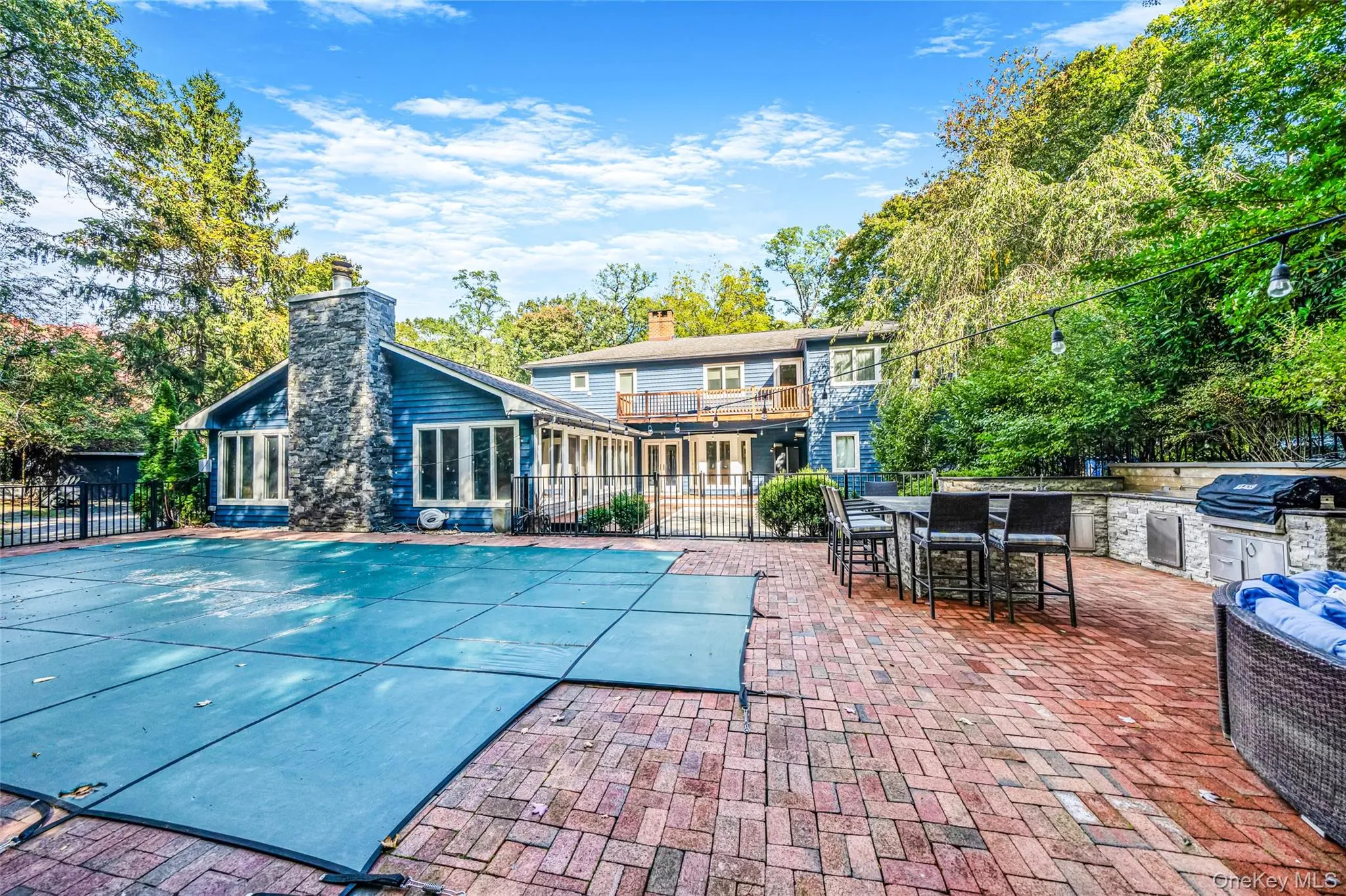 IG pool, seaprately fenced, brick patio, outdoor kitchen and access to side patio with hot tub and grassy play area IG pool, seaprately fenced, brick patio, outdoor kitchen and access to side patio with hot tub and grassy play area
