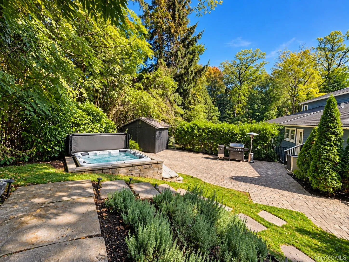Stone patio off Office and Pool, hot tub Stone patio off Office and Pool, hot tub
