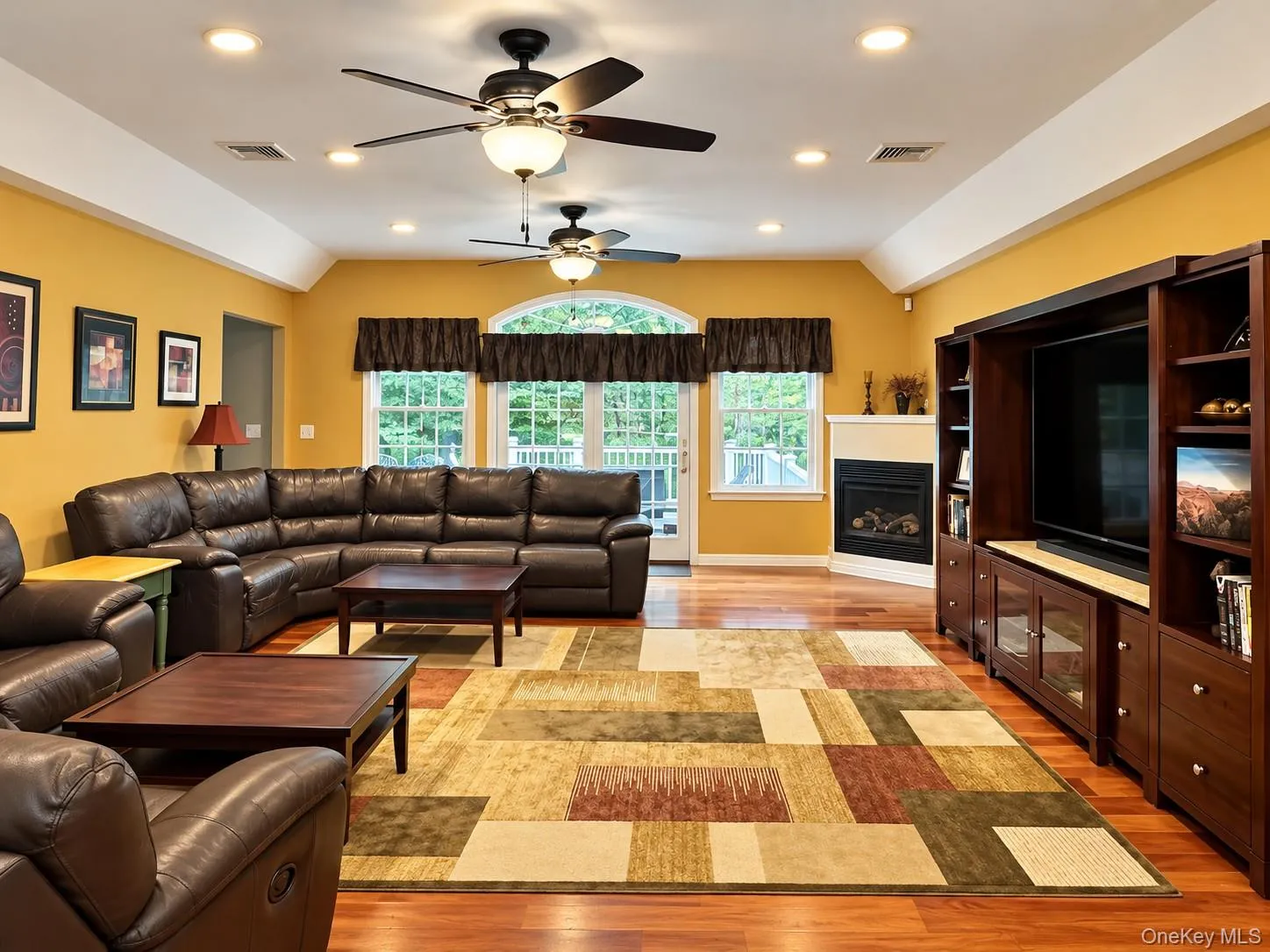 Family Room with wood floors, recessed lighting propane fireplace - Family Room with wood floors, recessed lighting propane fireplace -