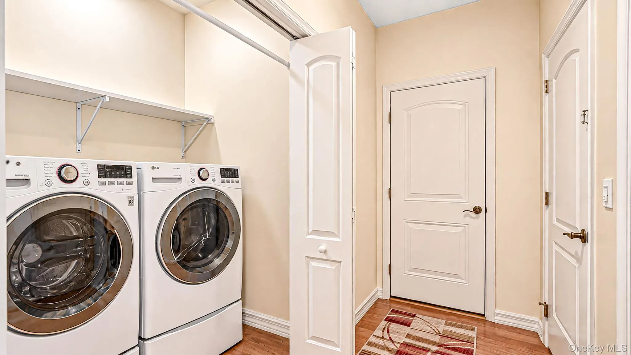Hall Laundry, located off garage and basement entrance Hall Laundry, located off garage and basement entrance