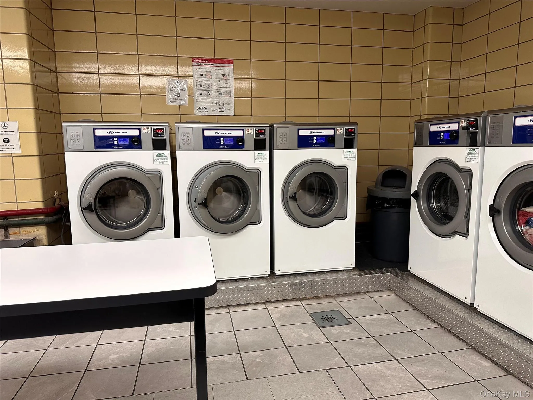 Coin operated laundry machines in the building. Coin operated laundry machines in the building.