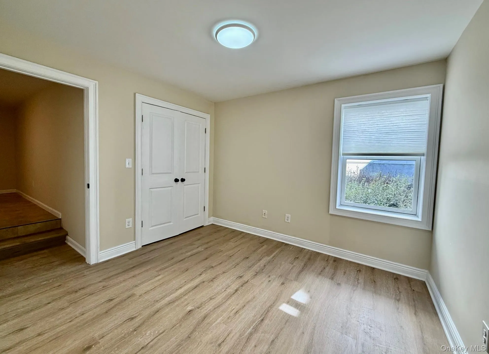 This bedroom leads to a private laundry room This bedroom leads to a private laundry room