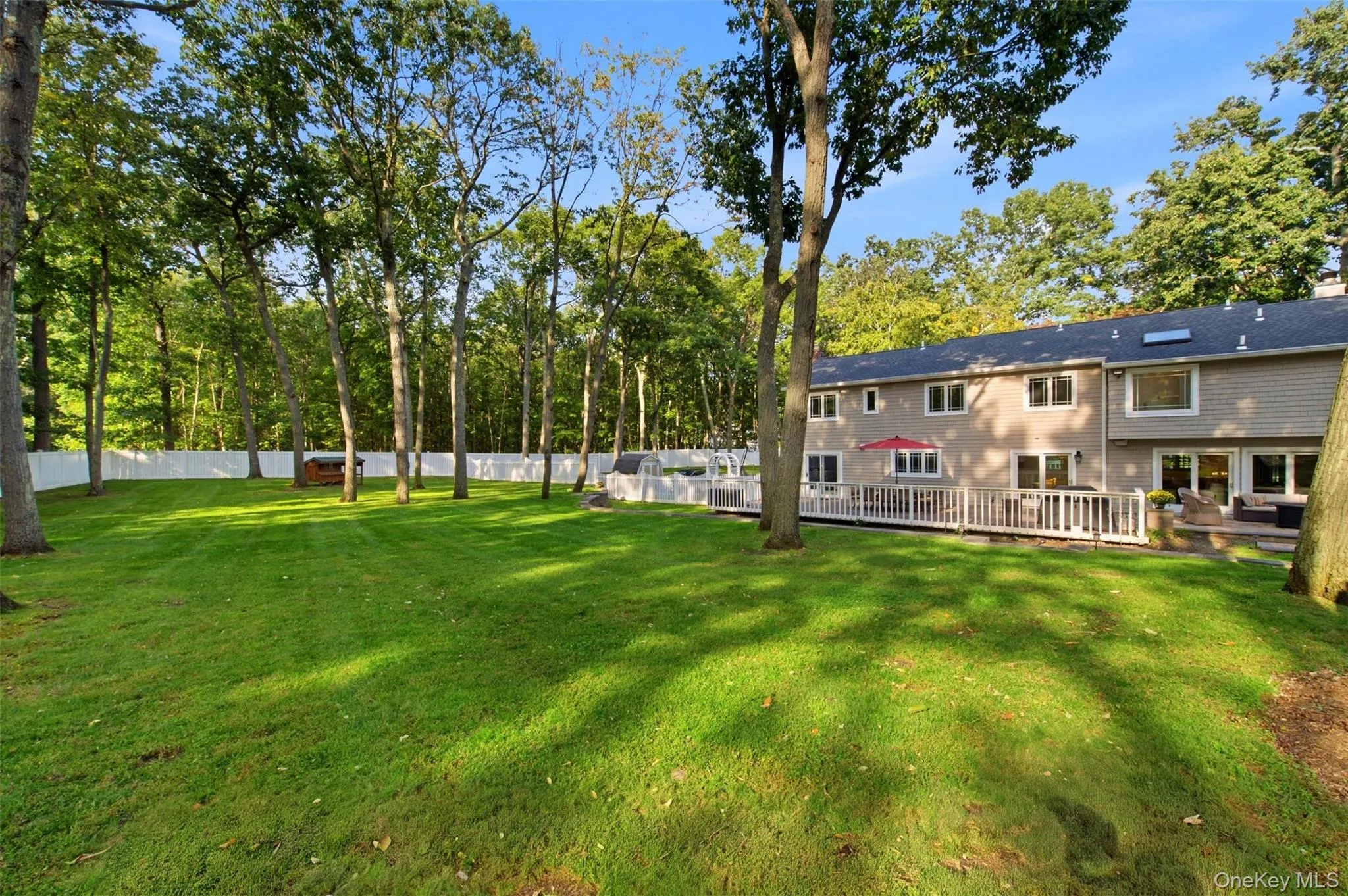 The yard is flat and completely fenced in and very private. The yard is flat and completely fenced in and very private.