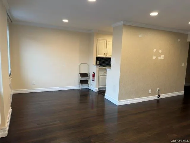 Dining Area with Dark Harwood Flooring, Recessed Lighting, Crown Molding Dining Area with Dark Harwood Flooring, Recessed Lighting, Crown Molding