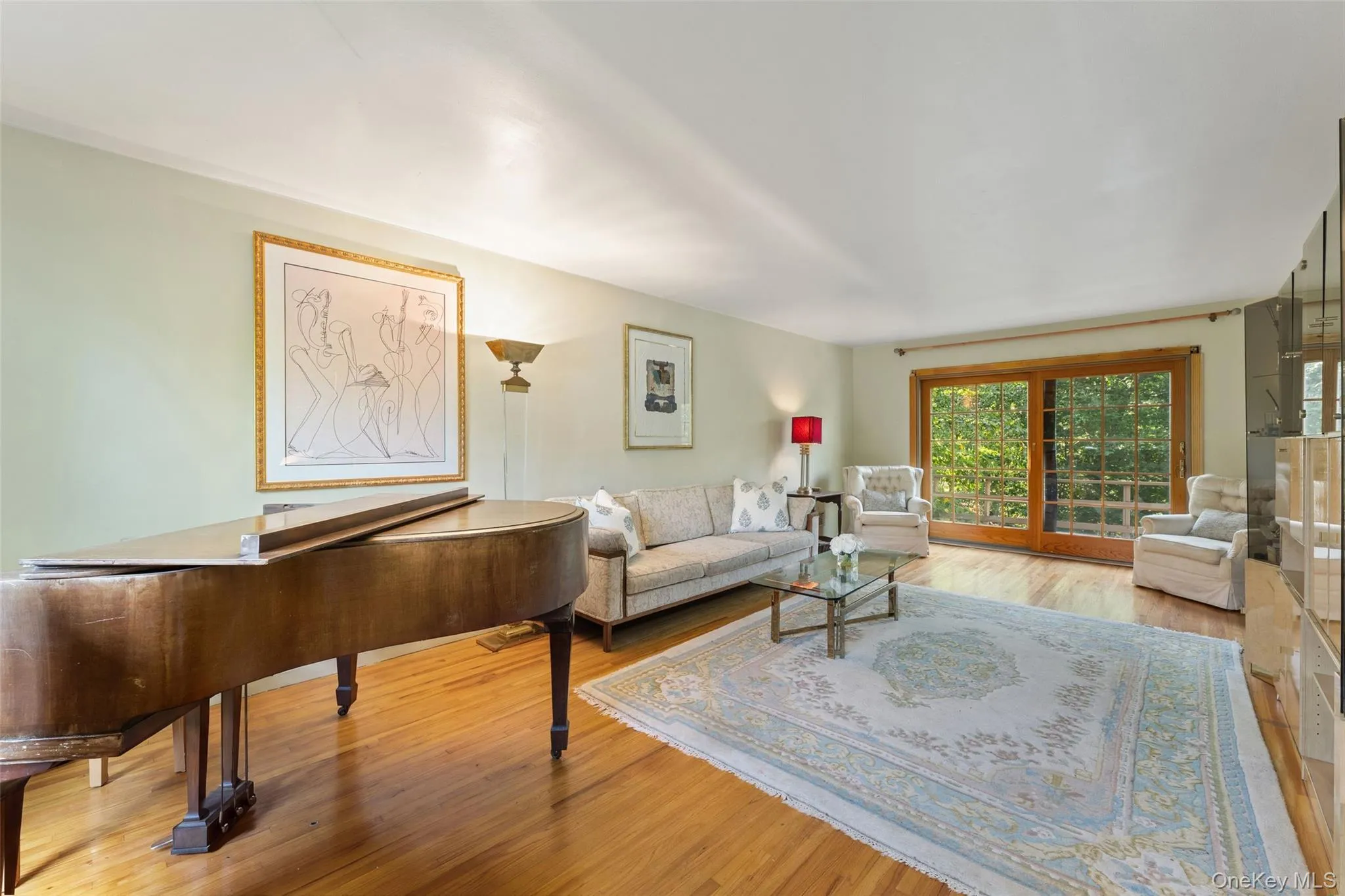 Hardwood flooring throughout with glass sliding doors to deck. Hardwood flooring throughout with glass sliding doors to deck.
