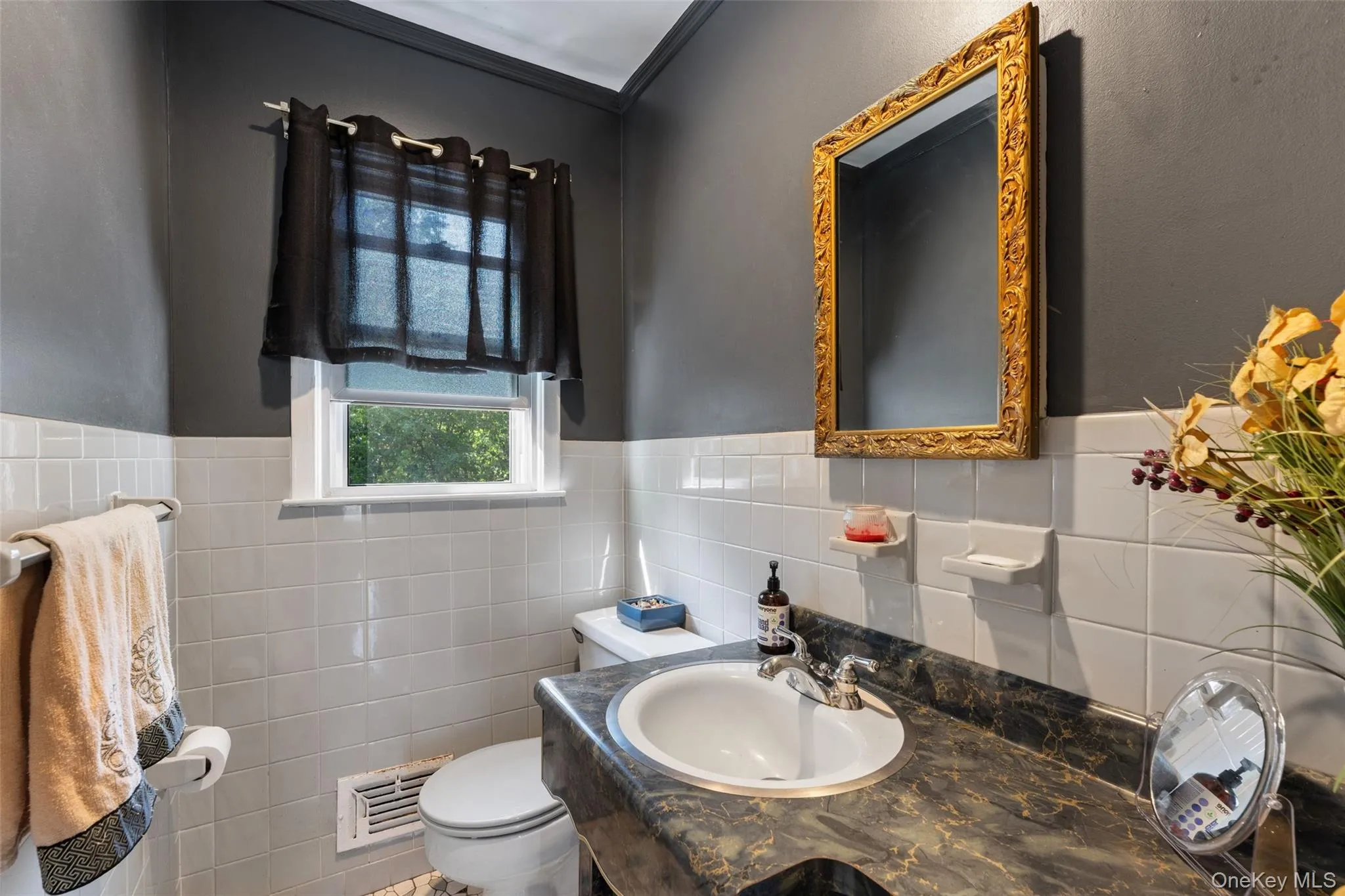 First floor powder room. First floor powder room.