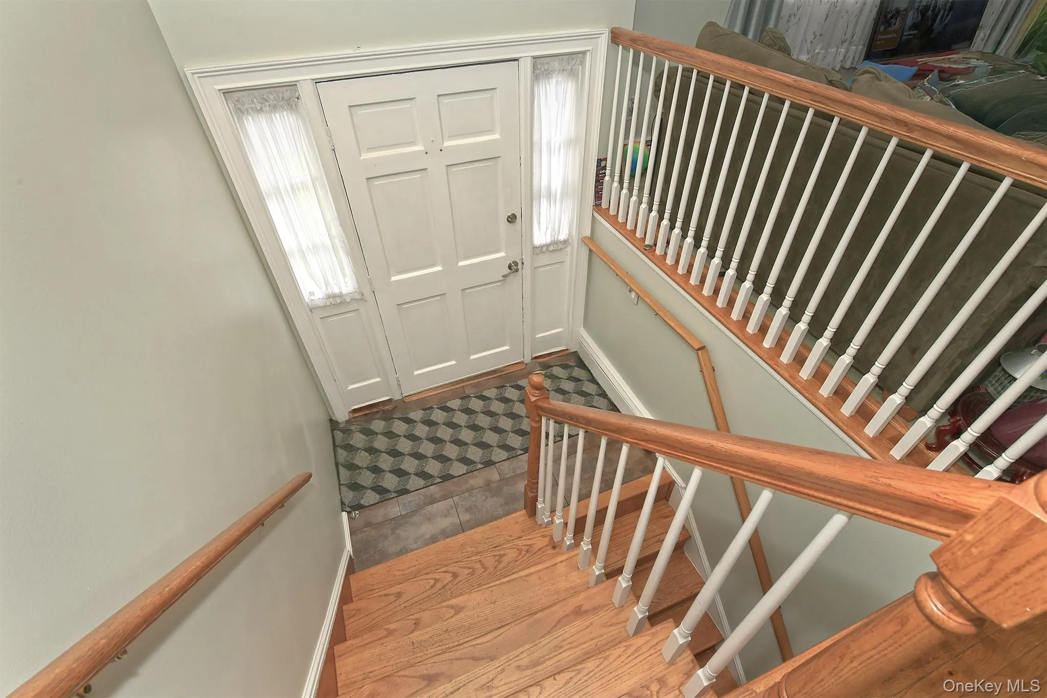 Oak Stairs, Rails leads to Entry Foyer Oak Stairs, Rails leads to Entry Foyer