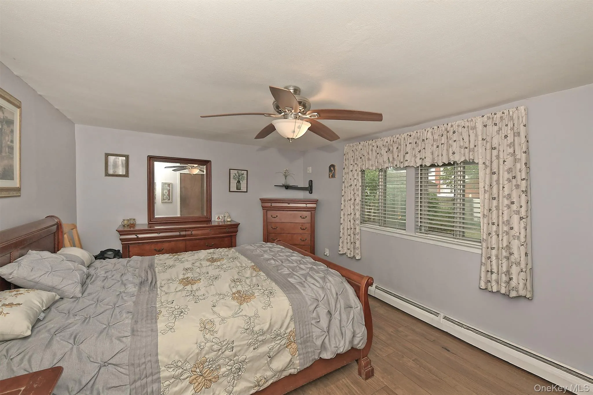 Lower Level Spacious Bedroom with Ceiling Fan Lower Level Spacious Bedroom with Ceiling Fan