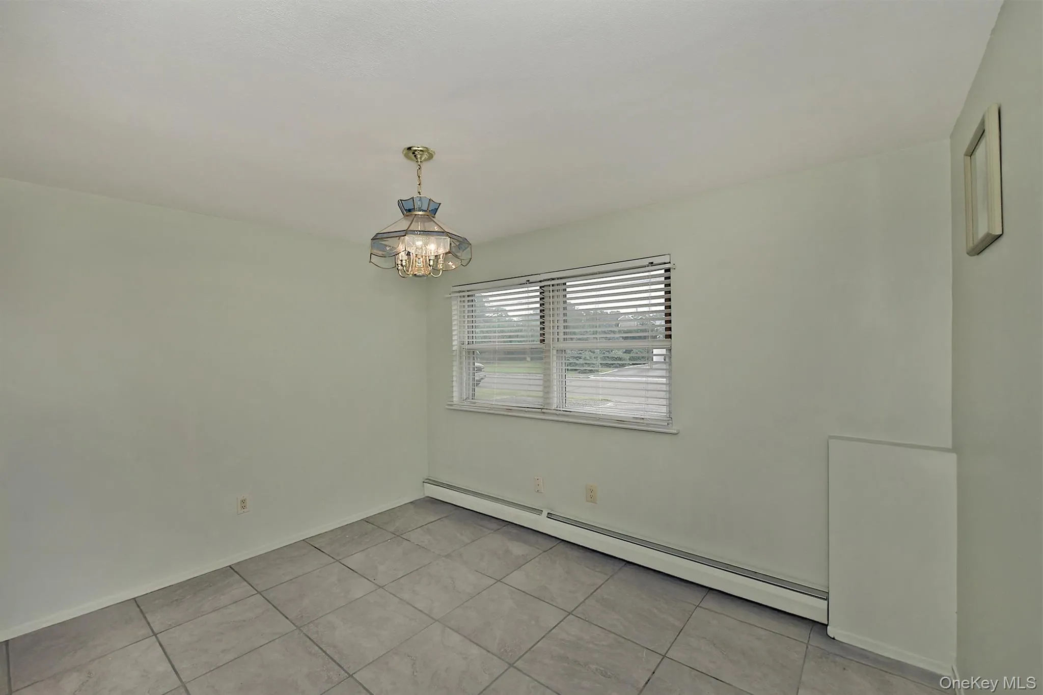 Lower Level 5th Bdrm with tile flooring Lower Level 5th Bdrm with tile flooring
