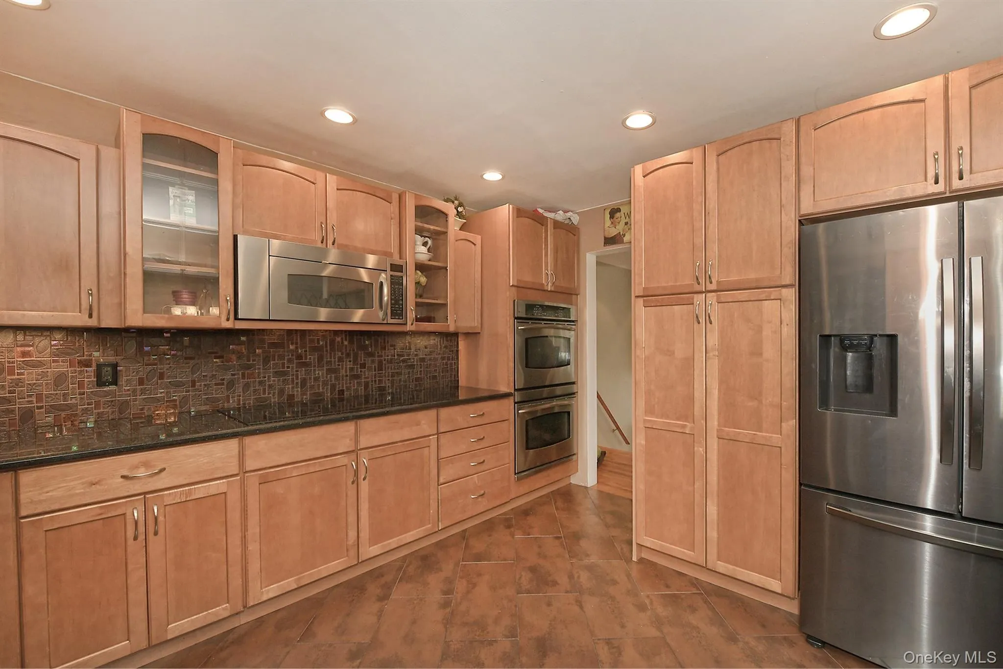 Large Fully Remodeled Kitchen, Many Cabinets, Pantry, Stainless Steel Appls., Porcelain Floor, Granite Counters, Island Seating Custom, Glass Backsplash & Dbl Wall Oven Large Fully Remodeled Kitchen, Many Cabinets, Pantry, Stainless Steel Appls., Porcelain Floor, Granite Counters, Island Seating Custom, Glass Backsplash & Dbl Wall Oven