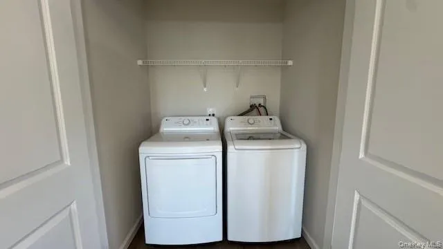 Laundry room with washer and clothes dryer Laundry room with washer and clothes dryer