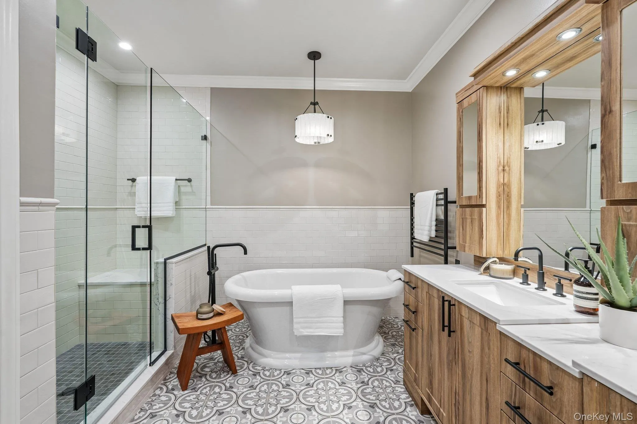 Spa inspired bathroom with soaking tub and oversized shower Spa inspired bathroom with soaking tub and oversized shower
