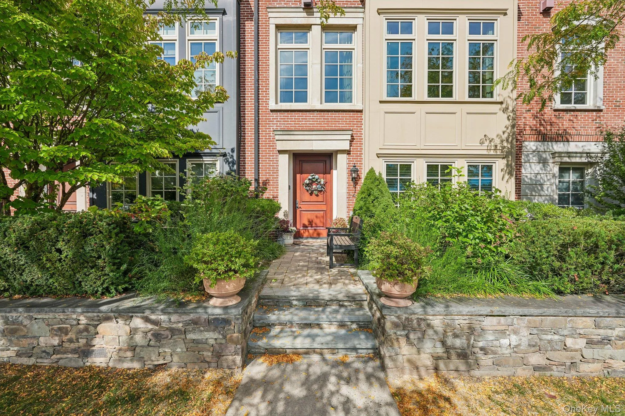 Brownstone entrance with exteriors designed after historic NYC brownstones Brownstone entrance with exteriors designed after historic NYC brownstones