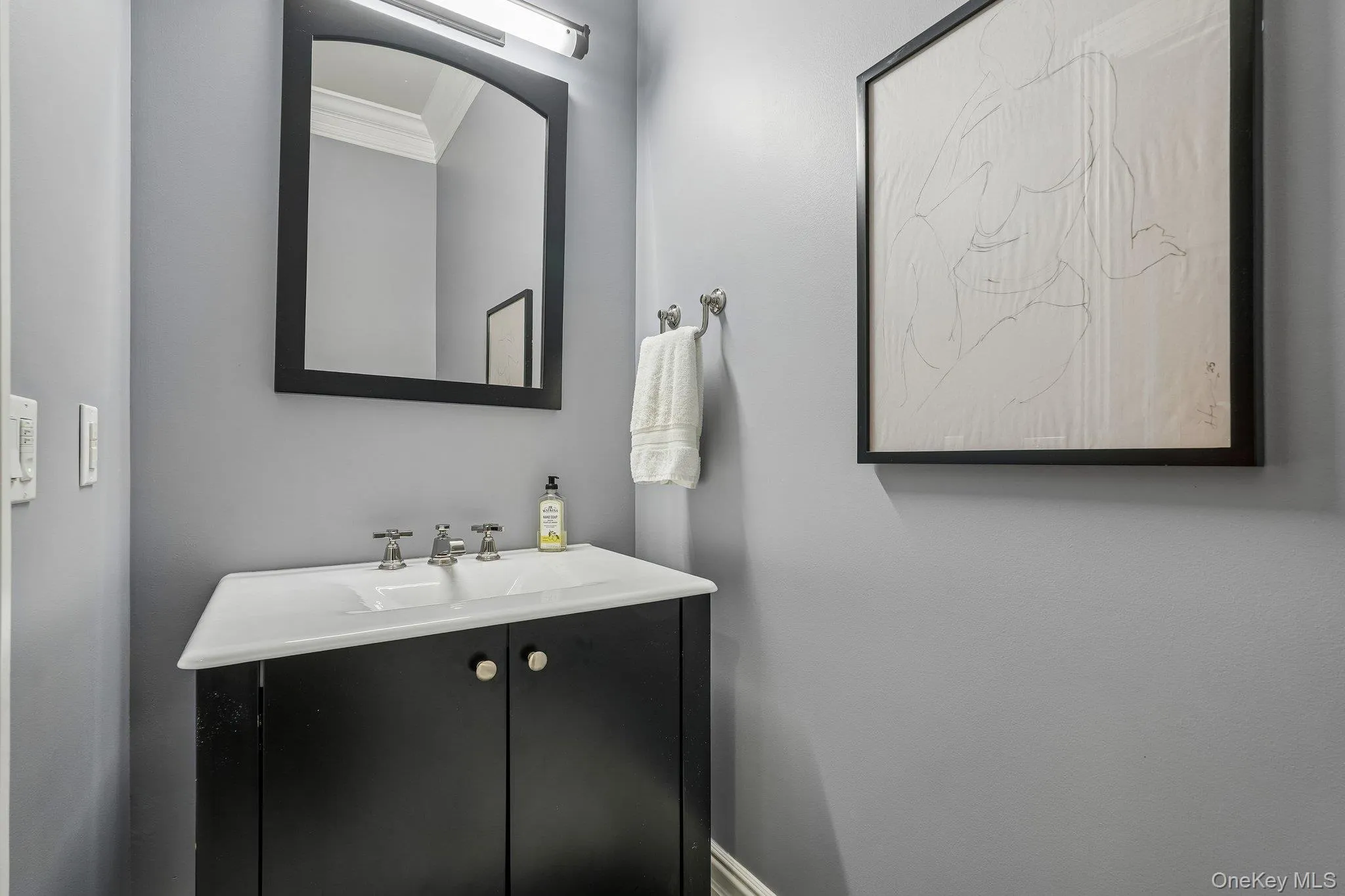 Powder Room on the Main living level Powder Room on the Main living level