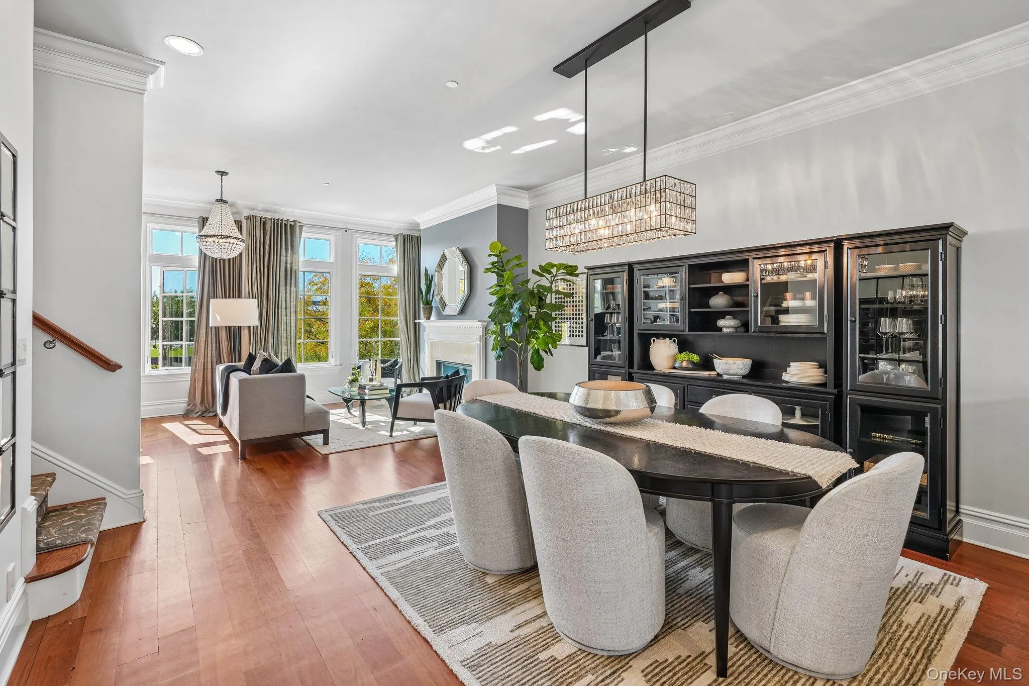 Formal Dining room open to the living room and kitchen has an amazing flow for entertaining Formal Dining room open to the living room and kitchen has an amazing flow for entertaining