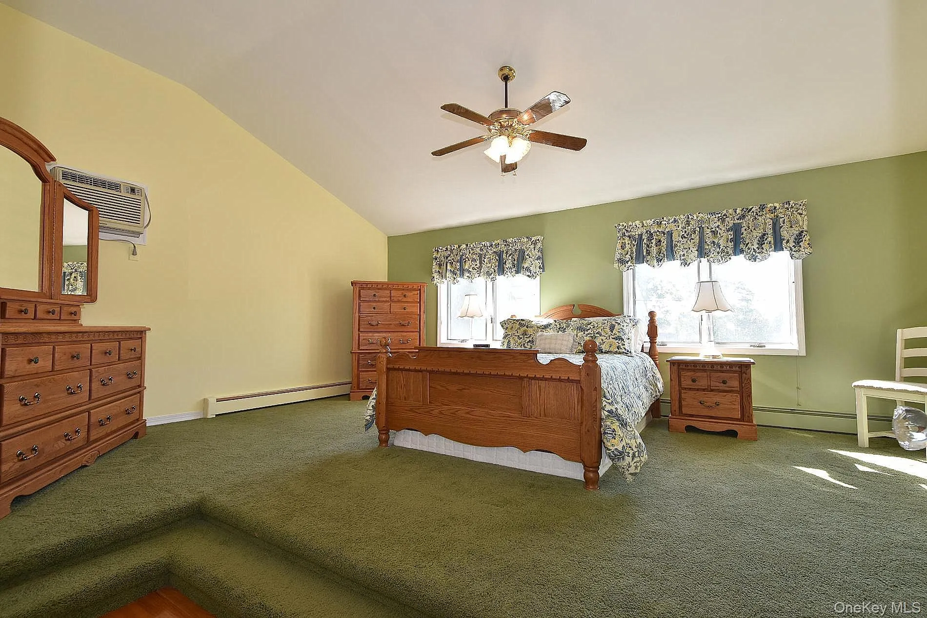Primary Bedroom with Vaulted Ceiling Primary Bedroom with Vaulted Ceiling